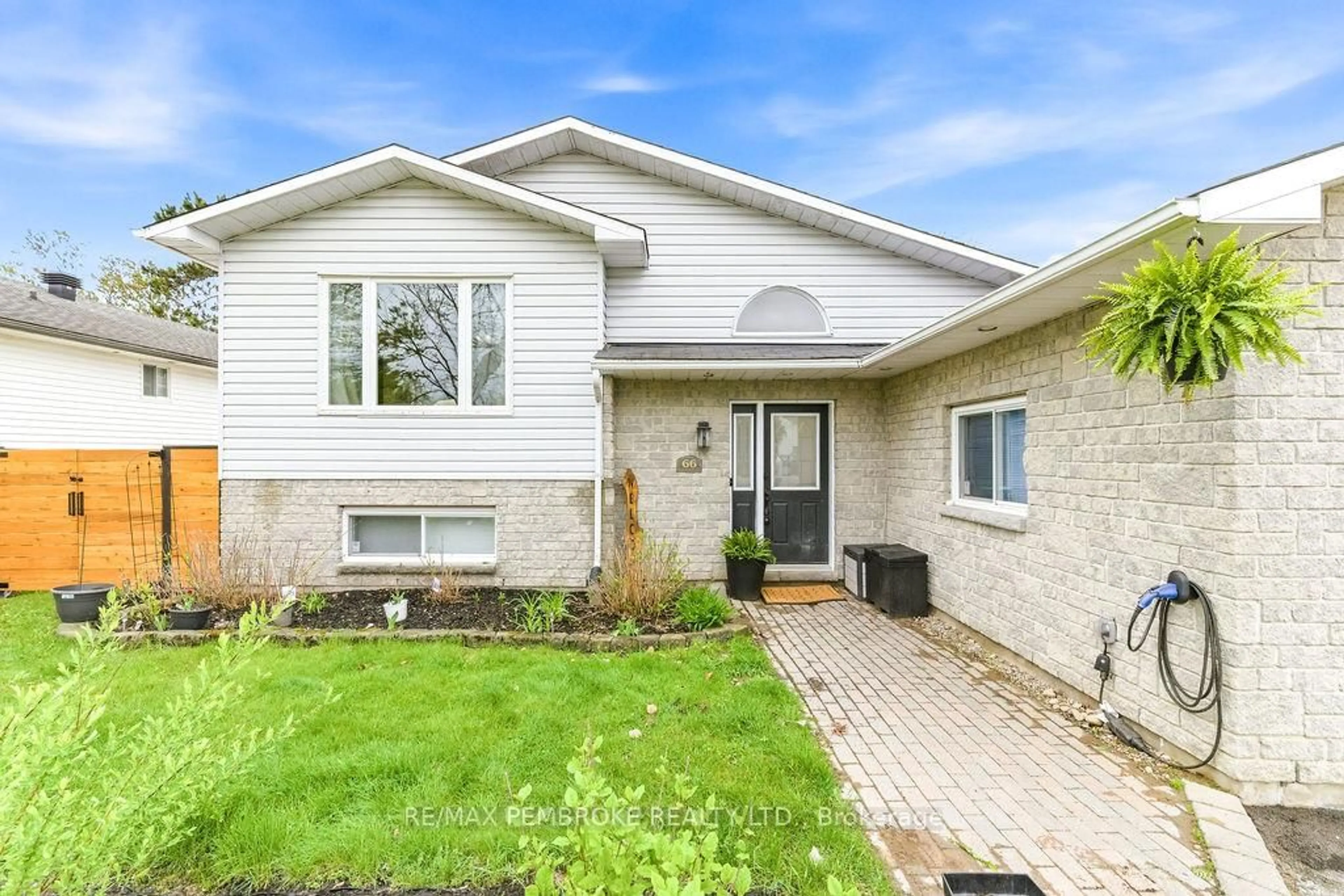Home with brick exterior material, street for 66 Woodland Cres, Petawawa Ontario K8H 3M1