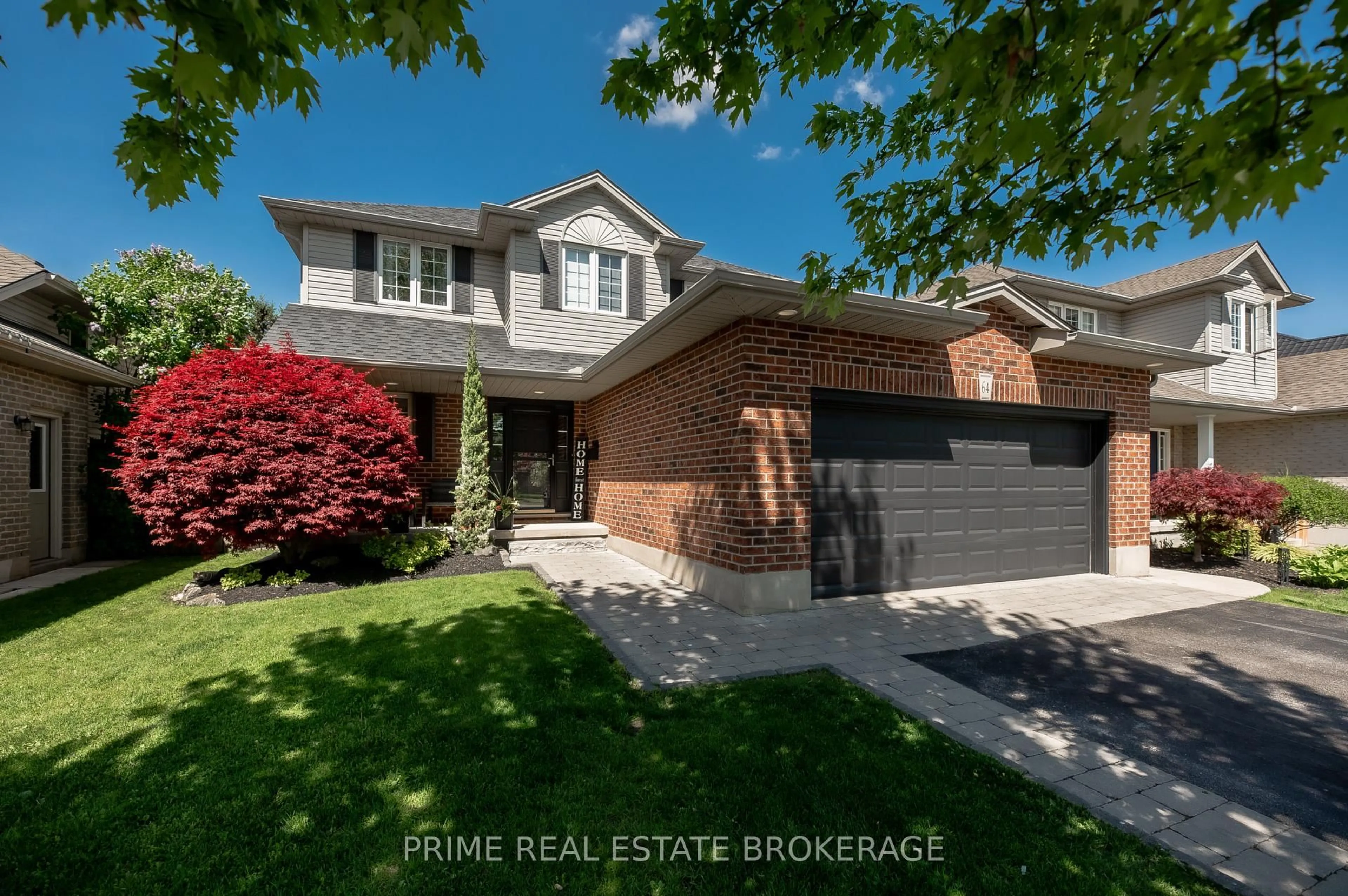 Home with brick exterior material, street for 64 Lake Margaret Tr, St. Thomas Ontario N5R 6K5
