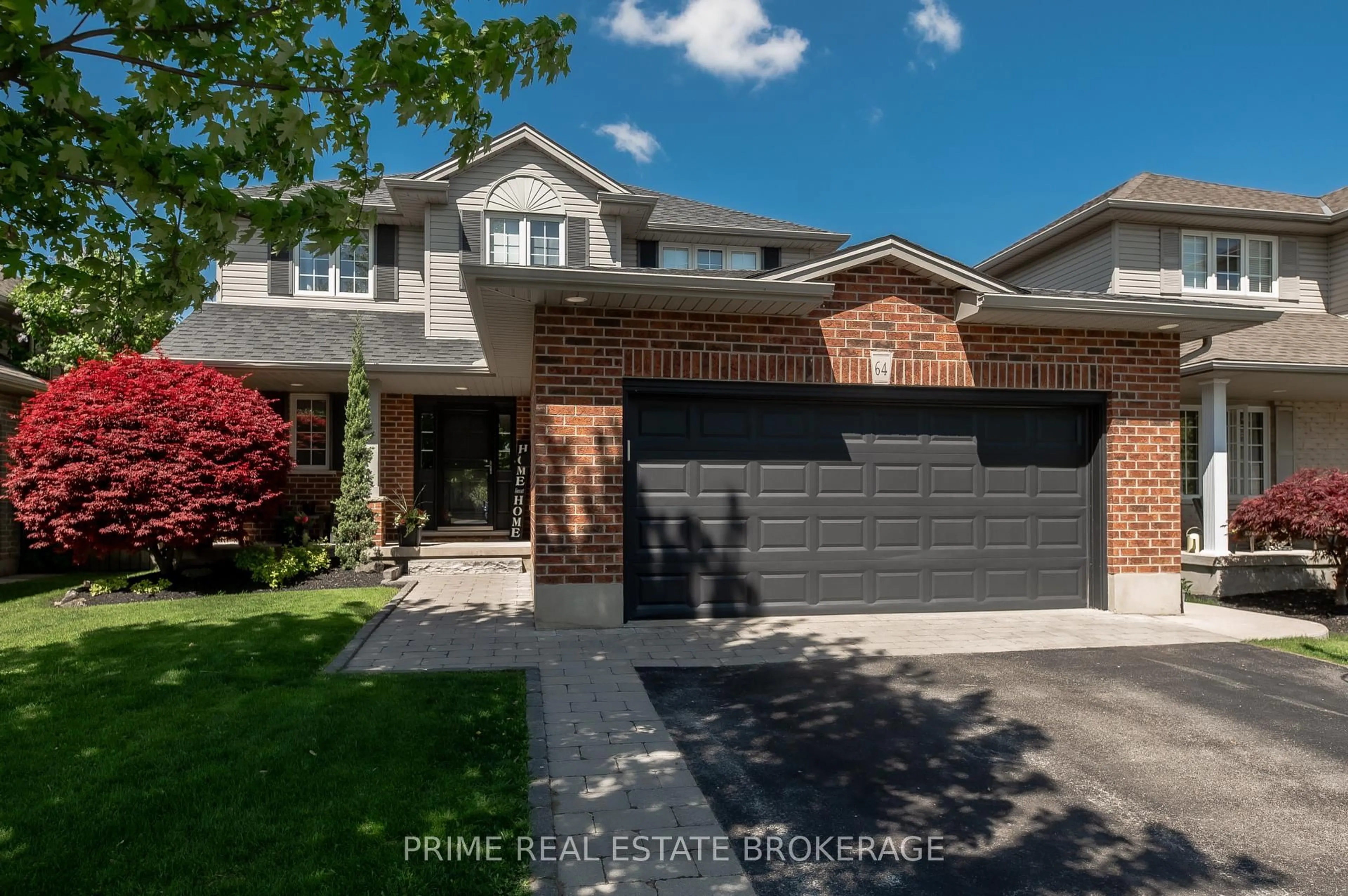Home with brick exterior material, street for 64 Lake Margaret Tr, St. Thomas Ontario N5R 6K5
