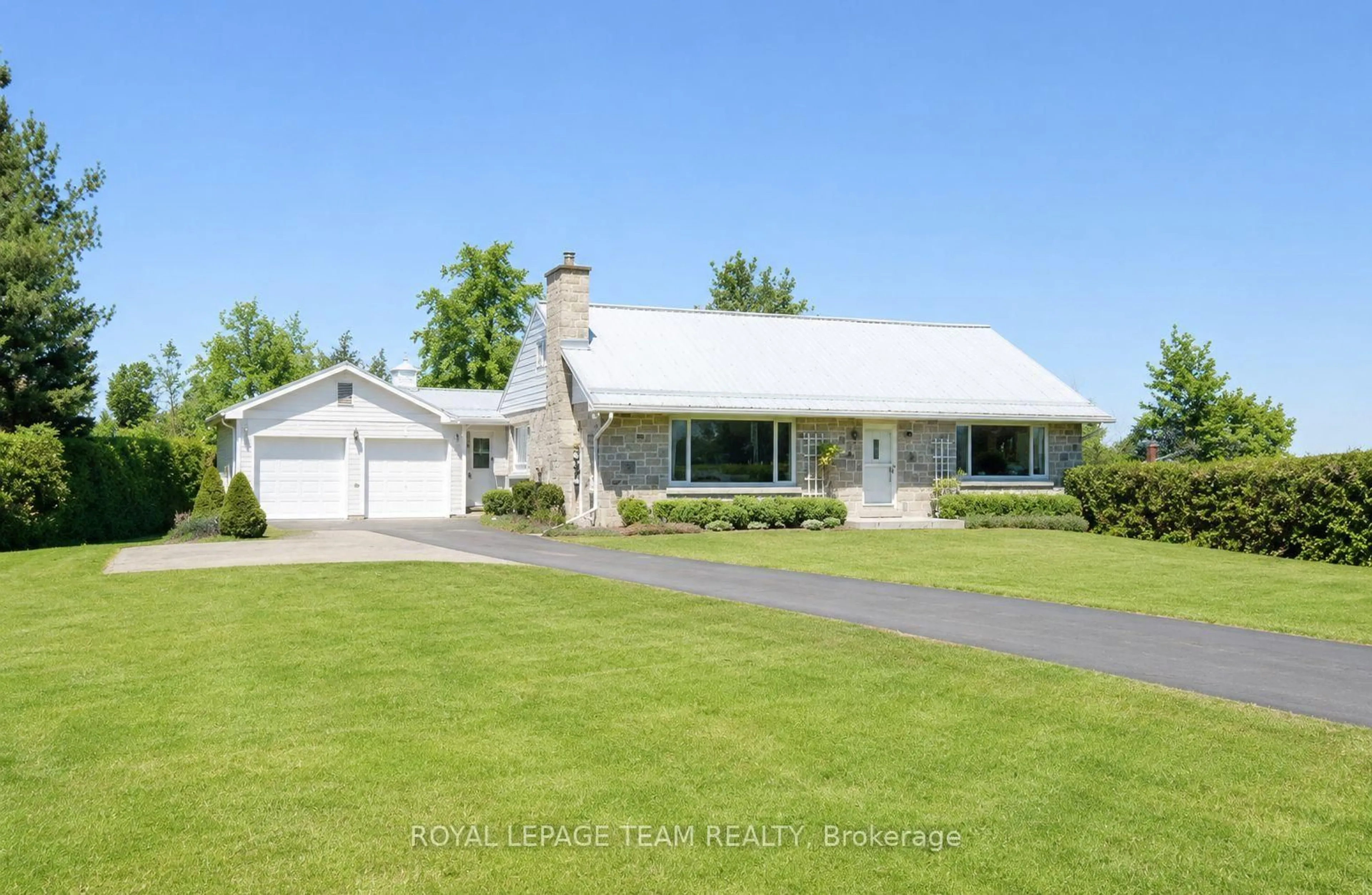 Home with vinyl exterior material, street for 2427 County Rd 18, North Grenville Ontario K0G 1J0