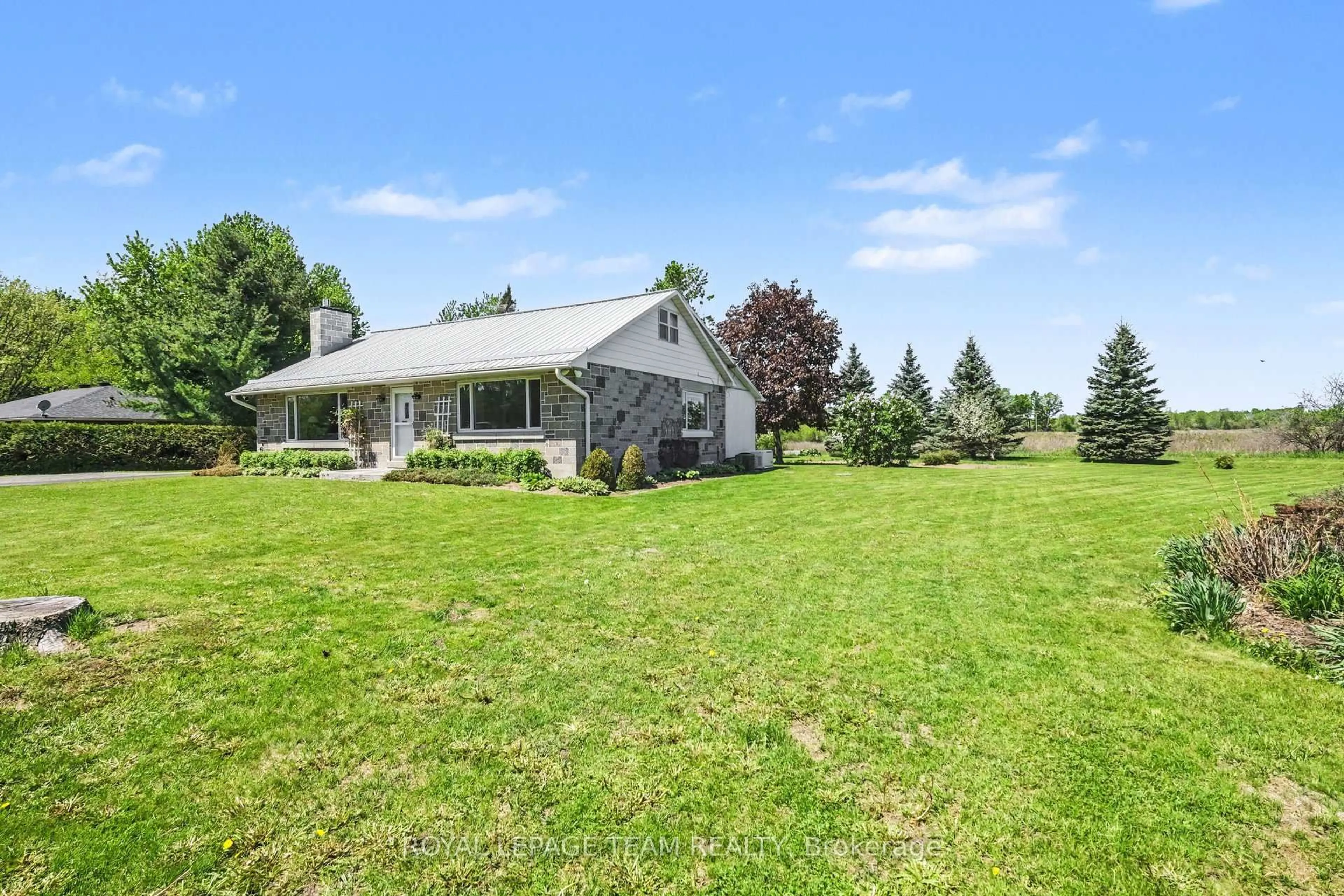 A pic from outside/outdoor area/front of a property/back of a property/a pic from drone, unknown for 2427 County Rd 18, North Grenville Ontario K0G 1J0