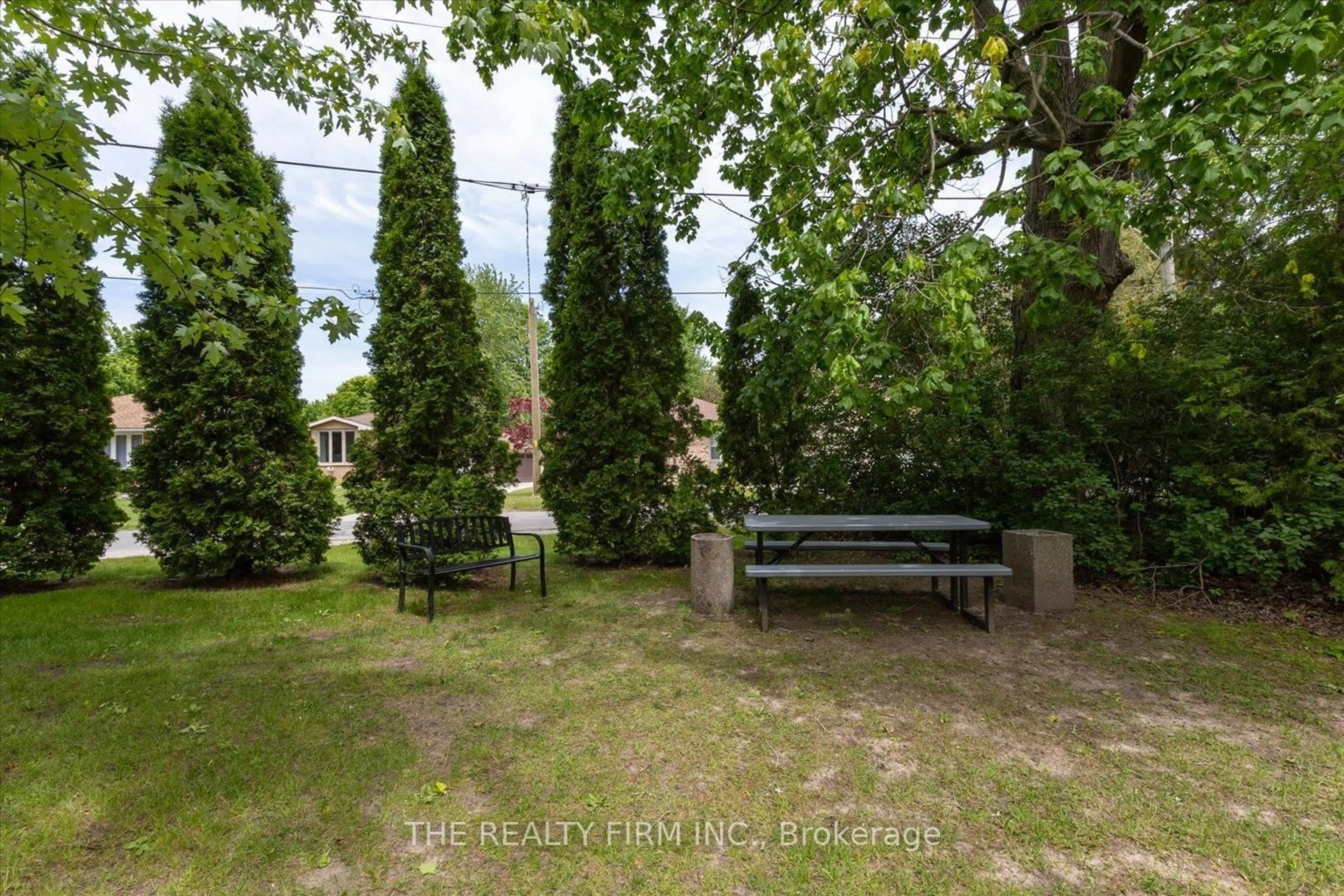 Patio, forest/trees view for 220 Duke St #207, Strathroy-Caradoc Ontario N7G 1S3