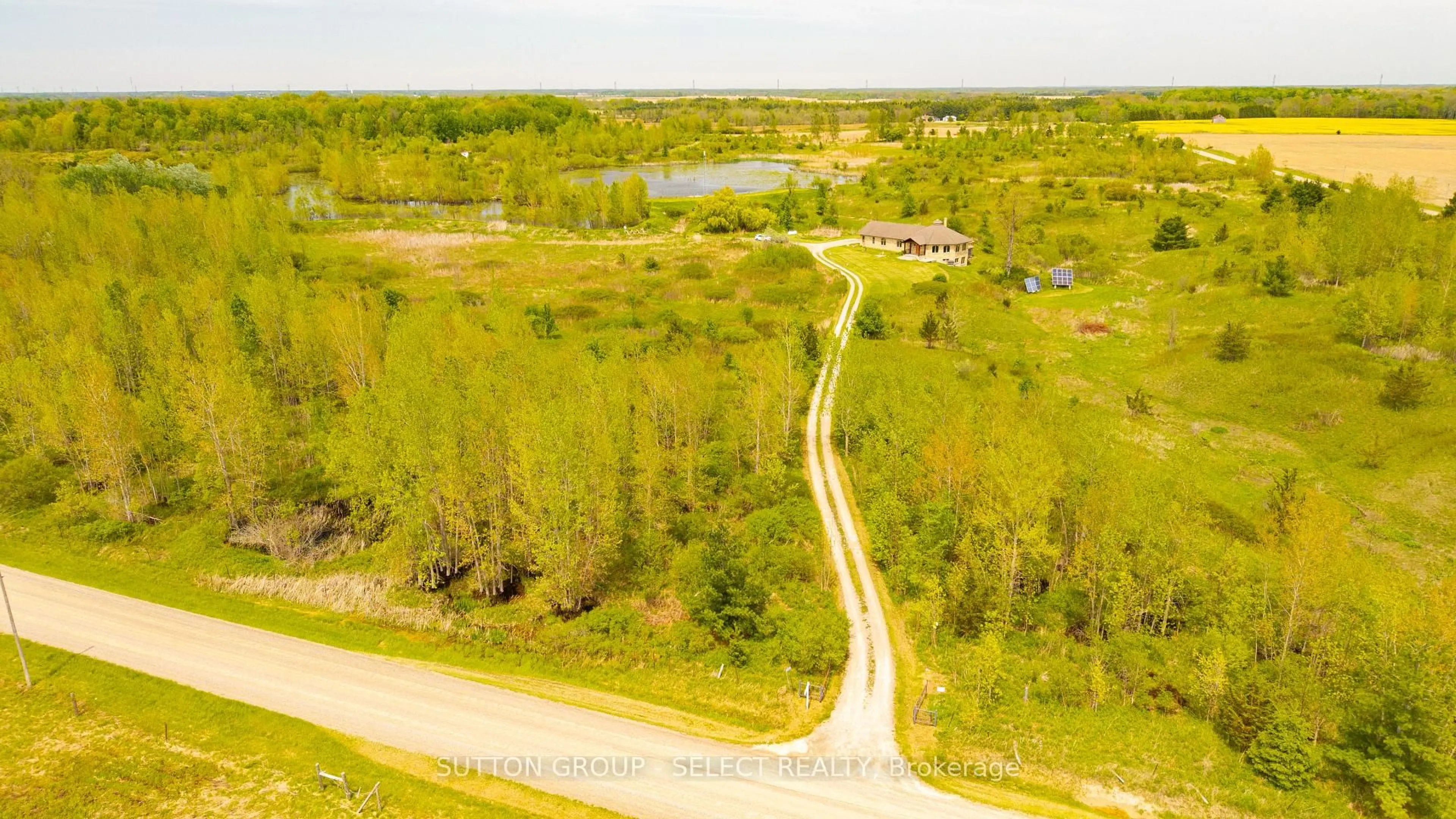 A pic from outside/outdoor area/front of a property/back of a property/a pic from drone, water/lake/river/ocean view for 21170 Mayfair Rd, Southwest Middlesex Ontario N0L 1T0