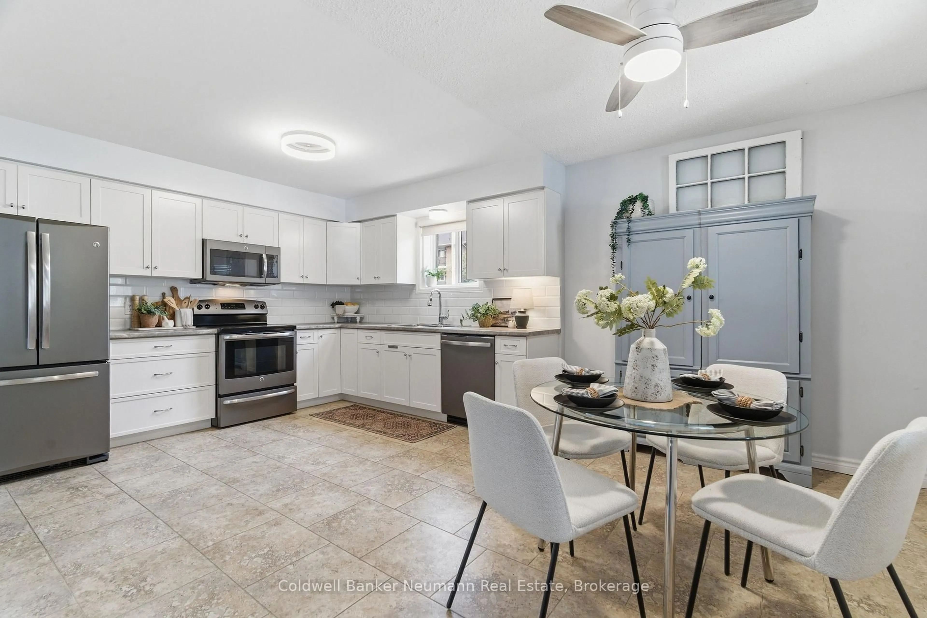Open concept kitchen, ceramic/tile floor for 440 Durham St #102, Wellington North Ontario N0G 2L1