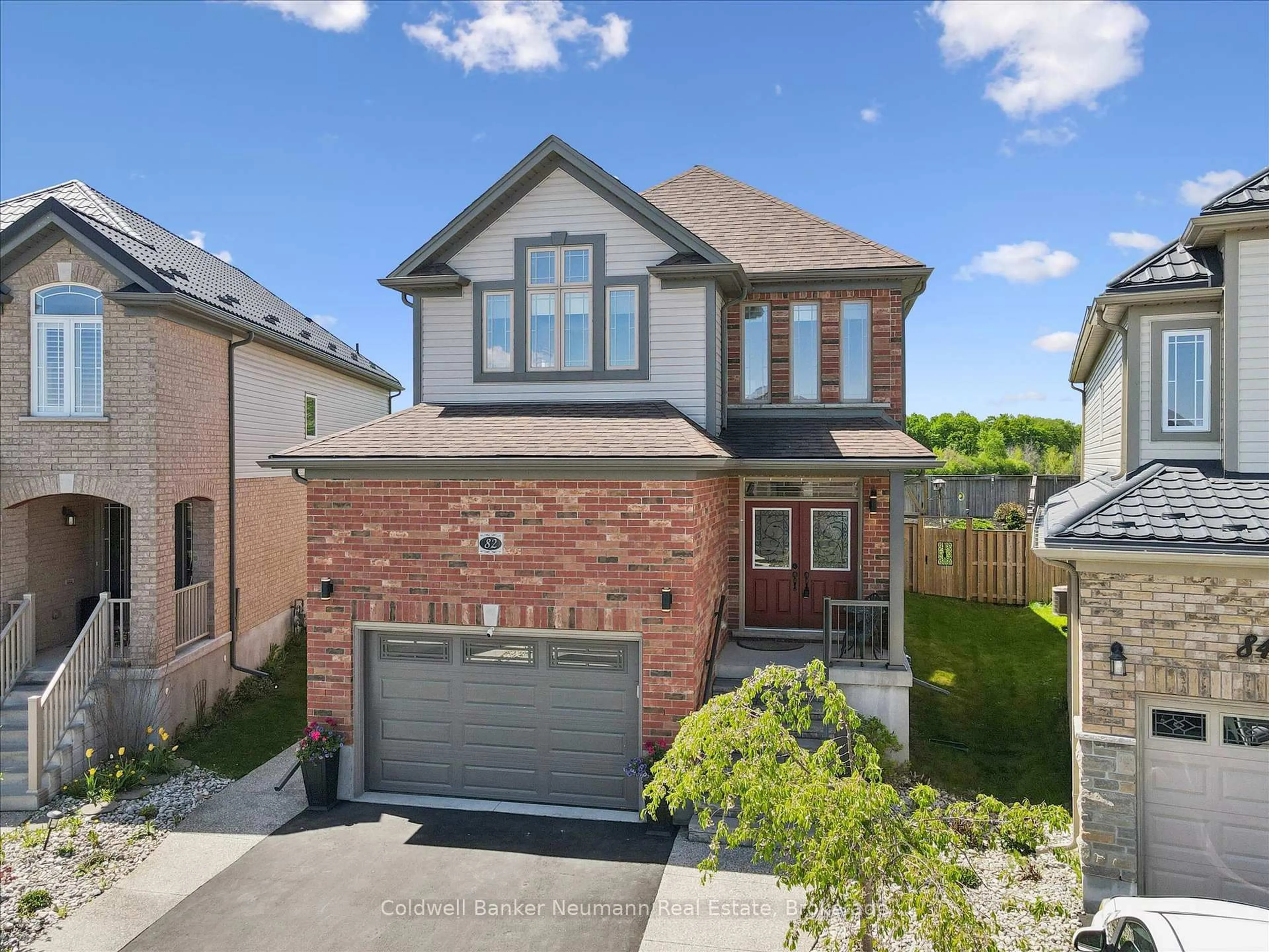 Home with brick exterior material, street for 82 Drone Cres, Guelph Ontario N1K 0C2