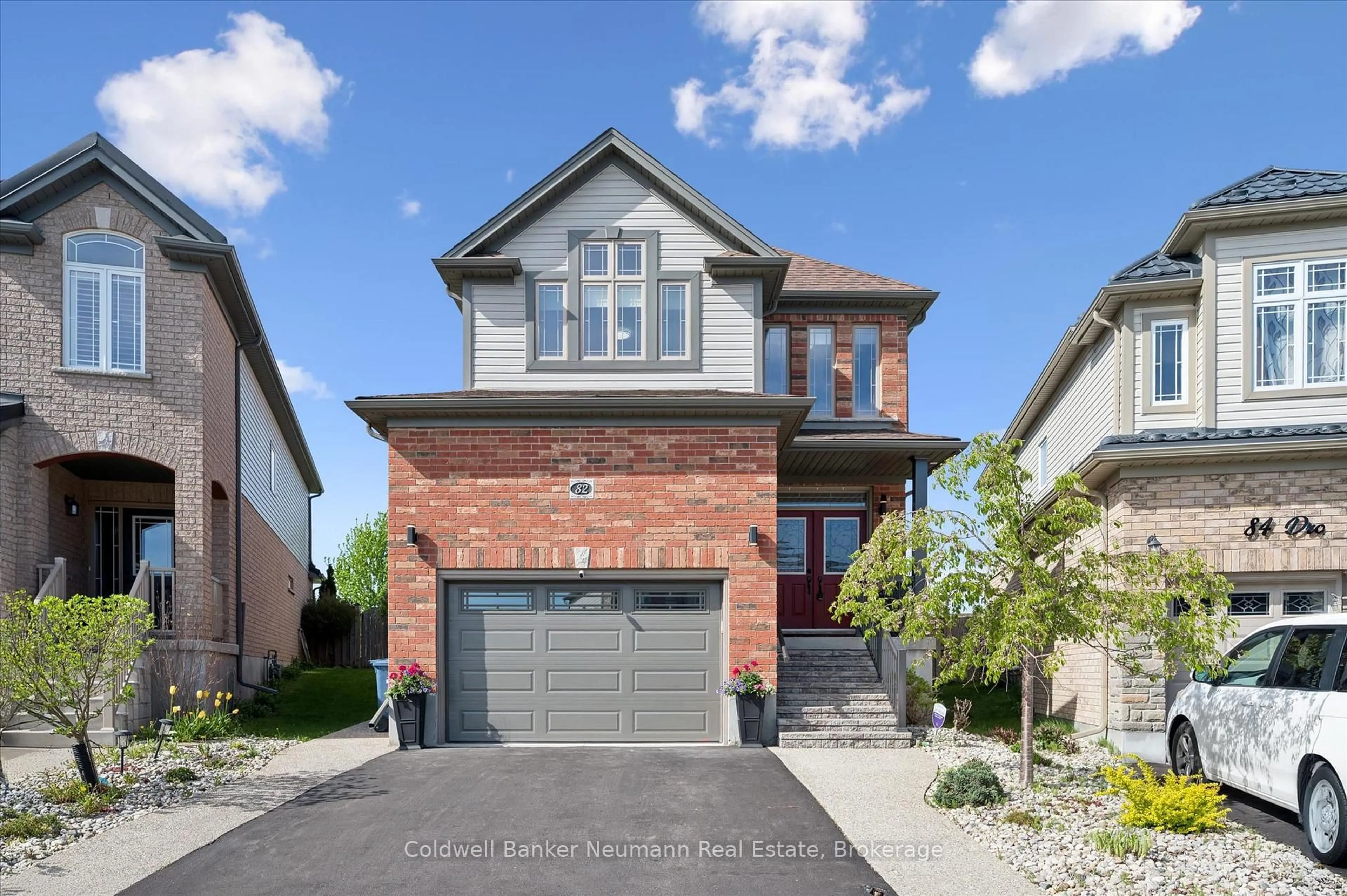 Home with brick exterior material, street for 82 Drone Cres, Guelph Ontario N1K 0C2