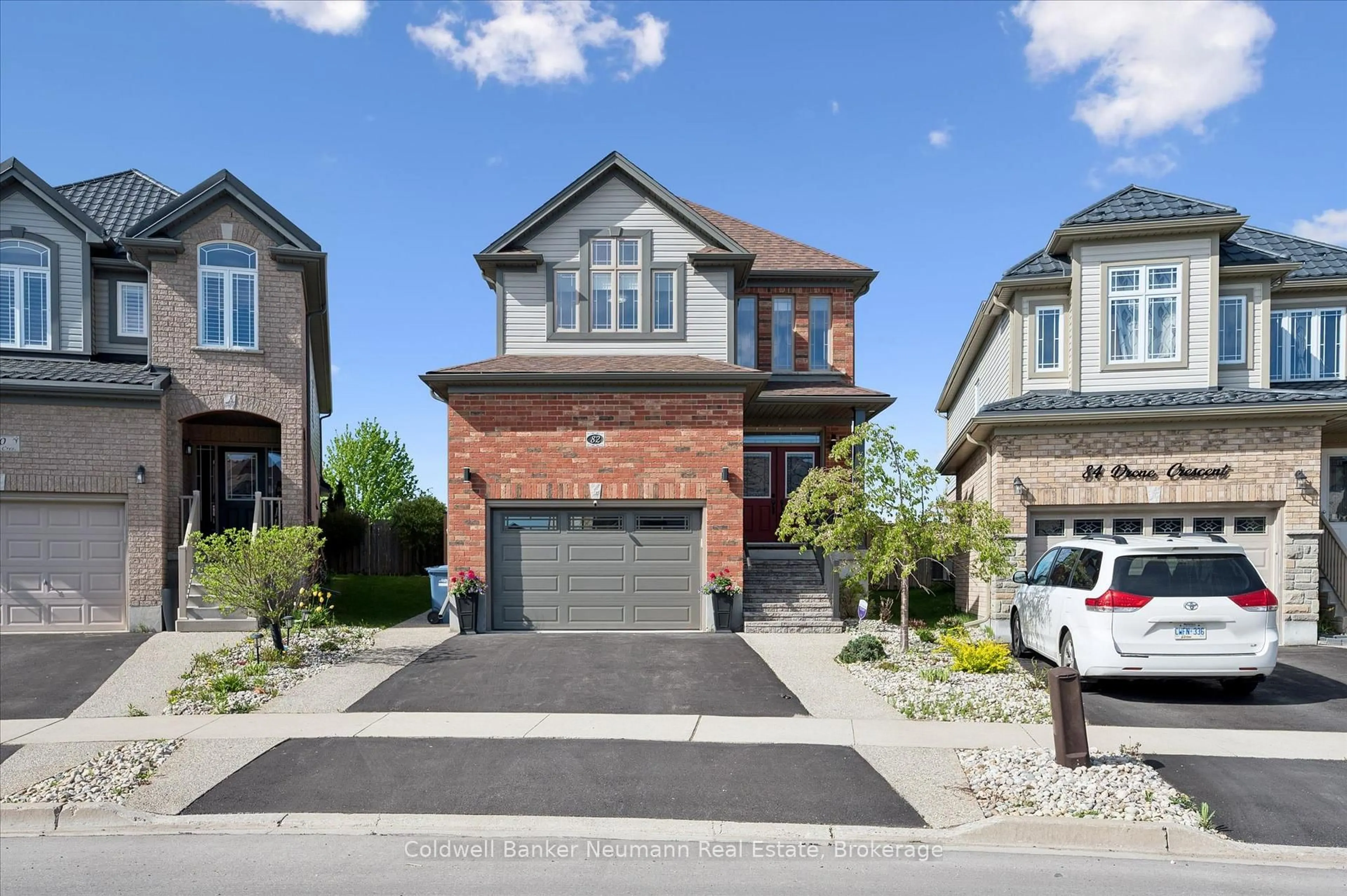 Home with brick exterior material, street for 82 Drone Cres, Guelph Ontario N1K 0C2