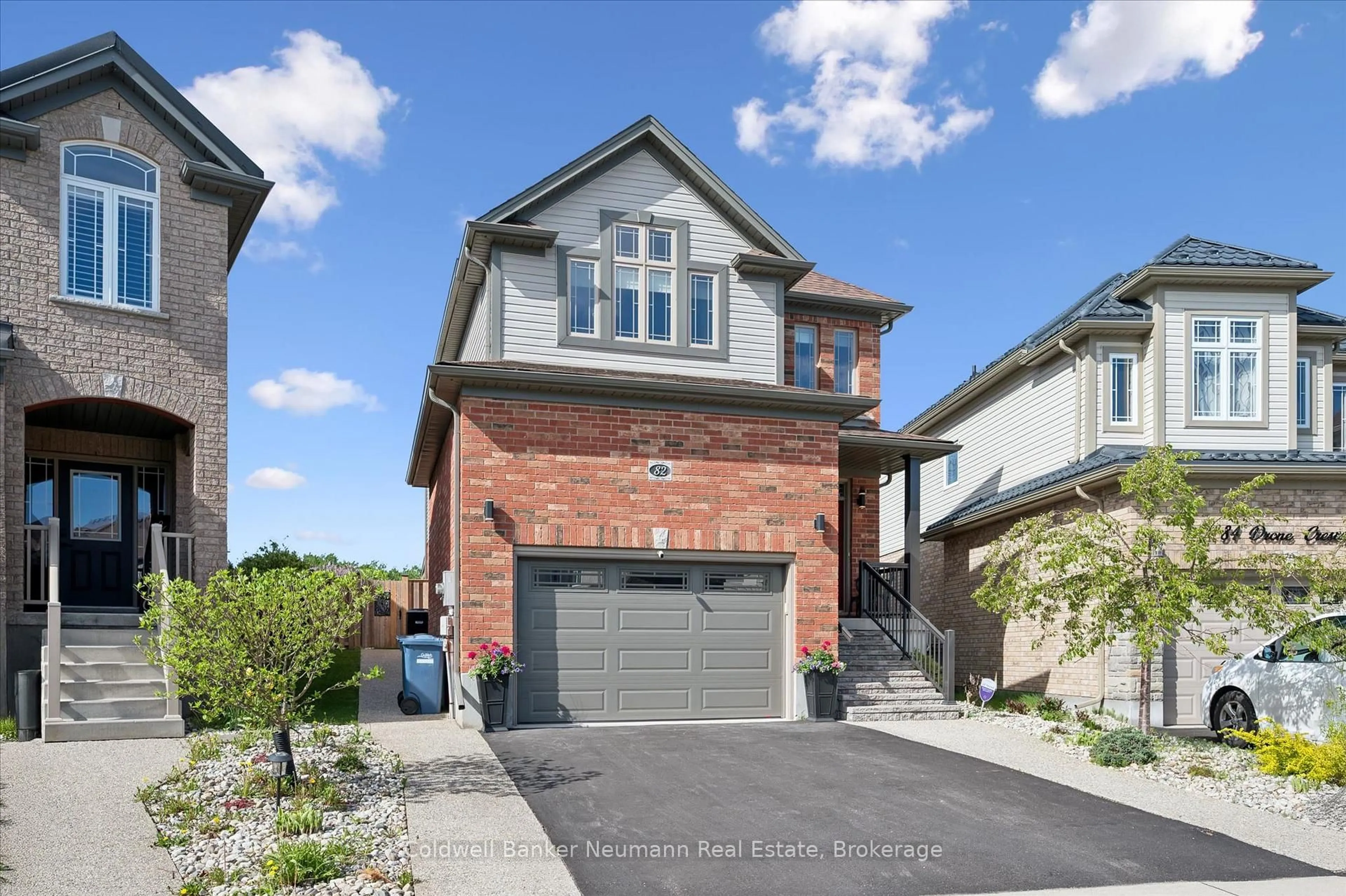 Home with brick exterior material, street for 82 Drone Cres, Guelph Ontario N1K 0C2