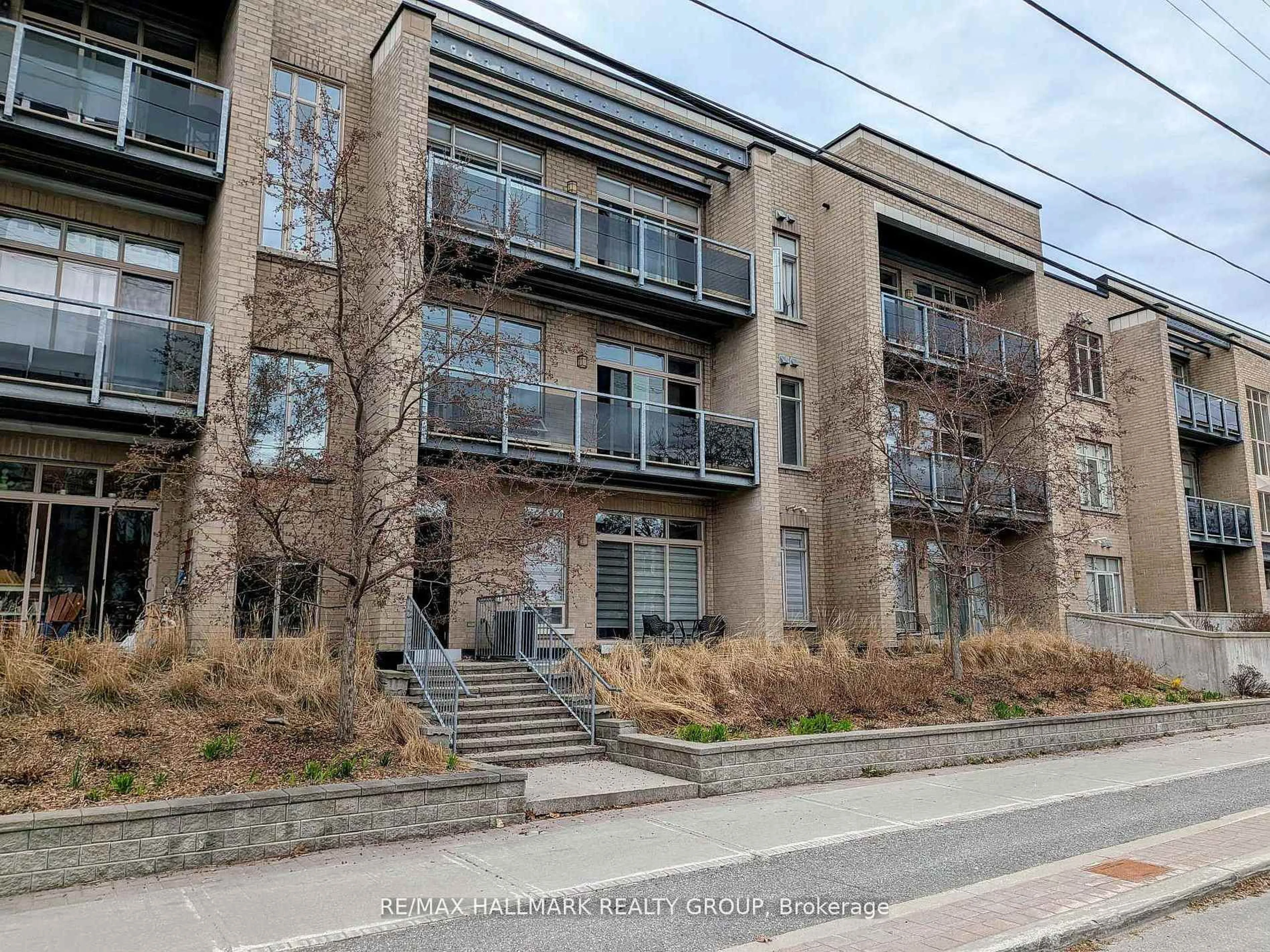 A pic from outside/outdoor area/front of a property/back of a property/a pic from drone, street for 682 Churchill Ave #210, Ottawa Ontario K1Z 5G5