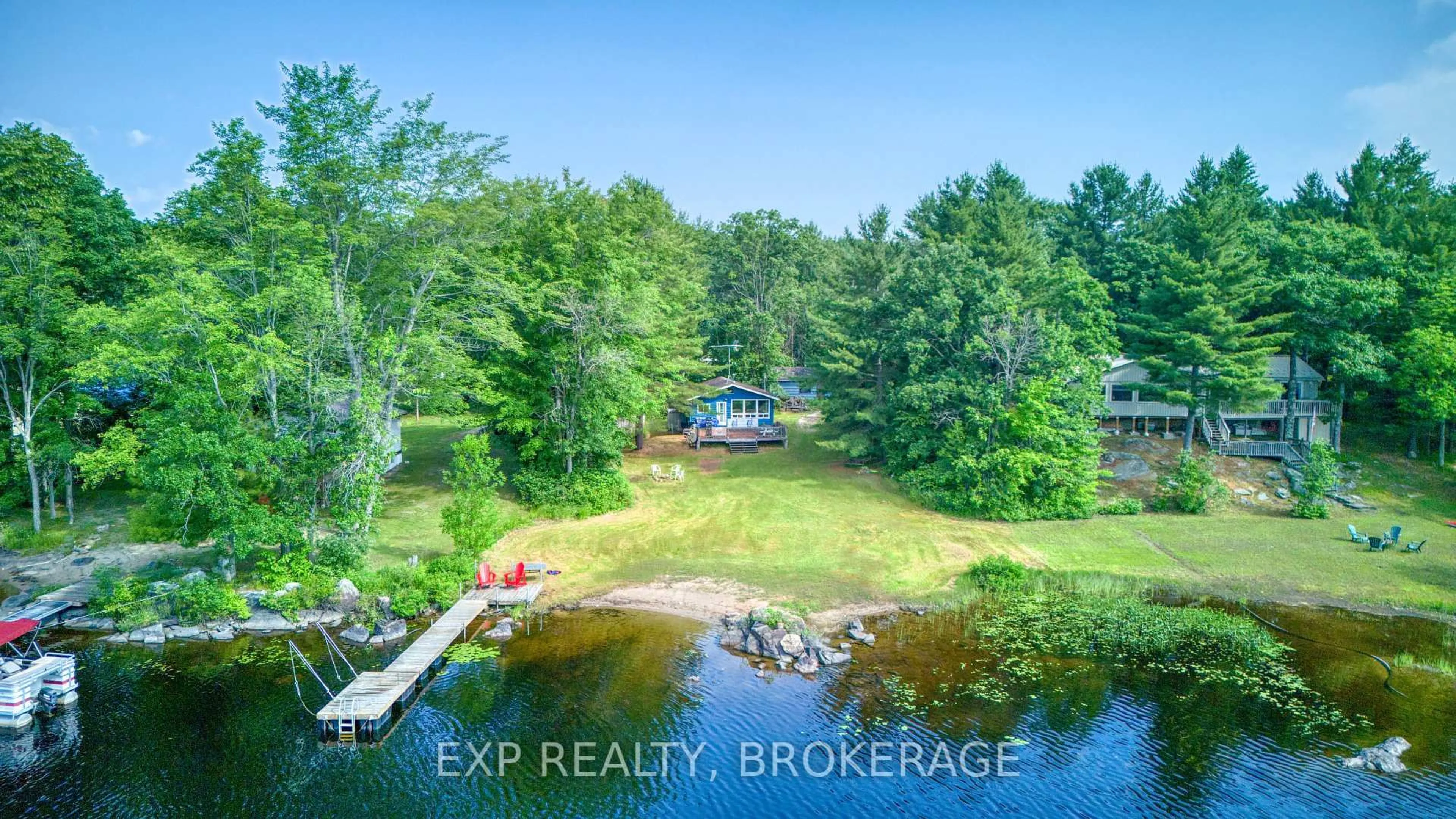 A pic from outside/outdoor area/front of a property/back of a property/a pic from drone, water/lake/river/ocean view for 1036 Turner Way, Arden Ontario K0H 1B0