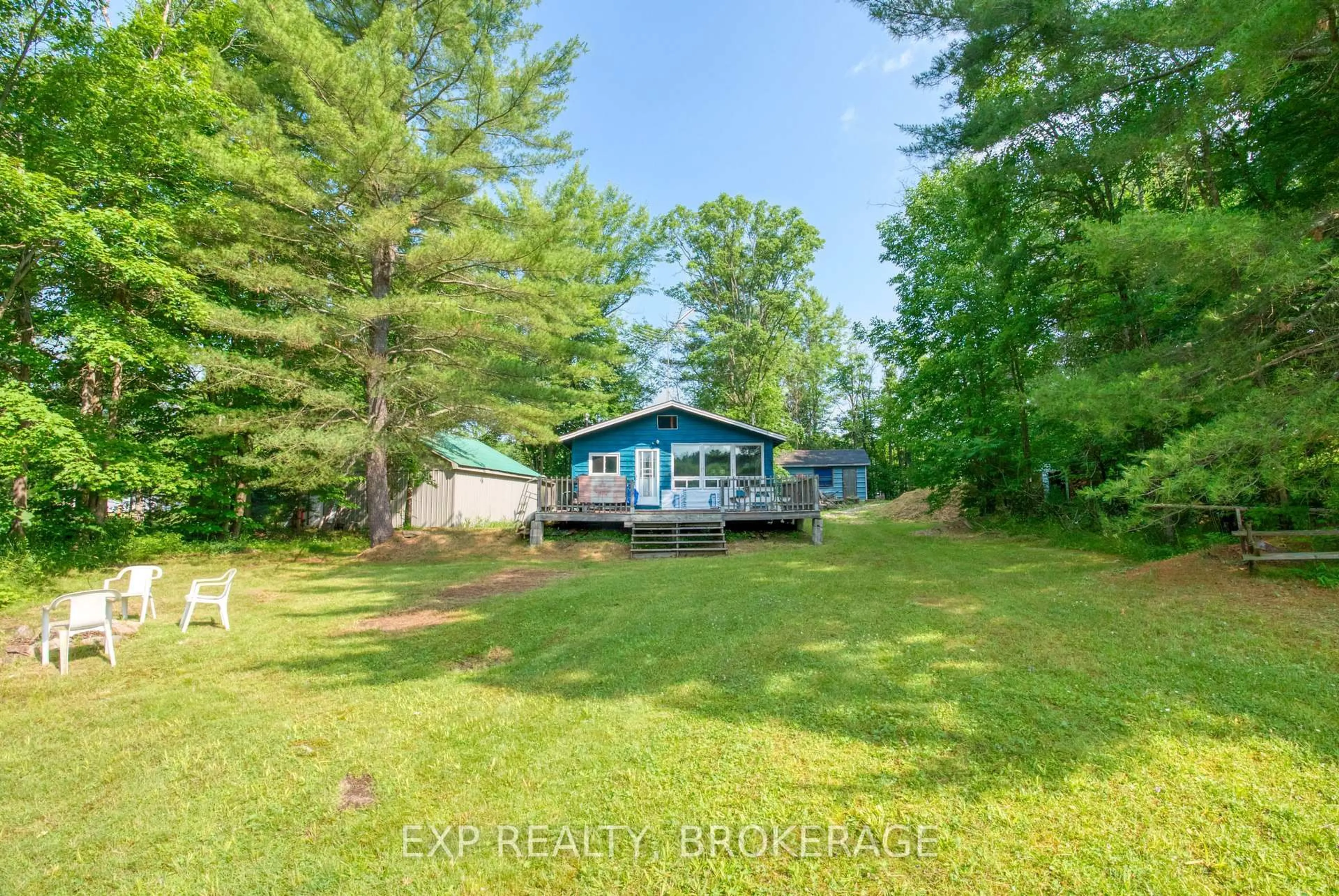 A pic from outside/outdoor area/front of a property/back of a property/a pic from drone, water/lake/river/ocean view for 1036 Turner Way, Arden Ontario K0H 1B0