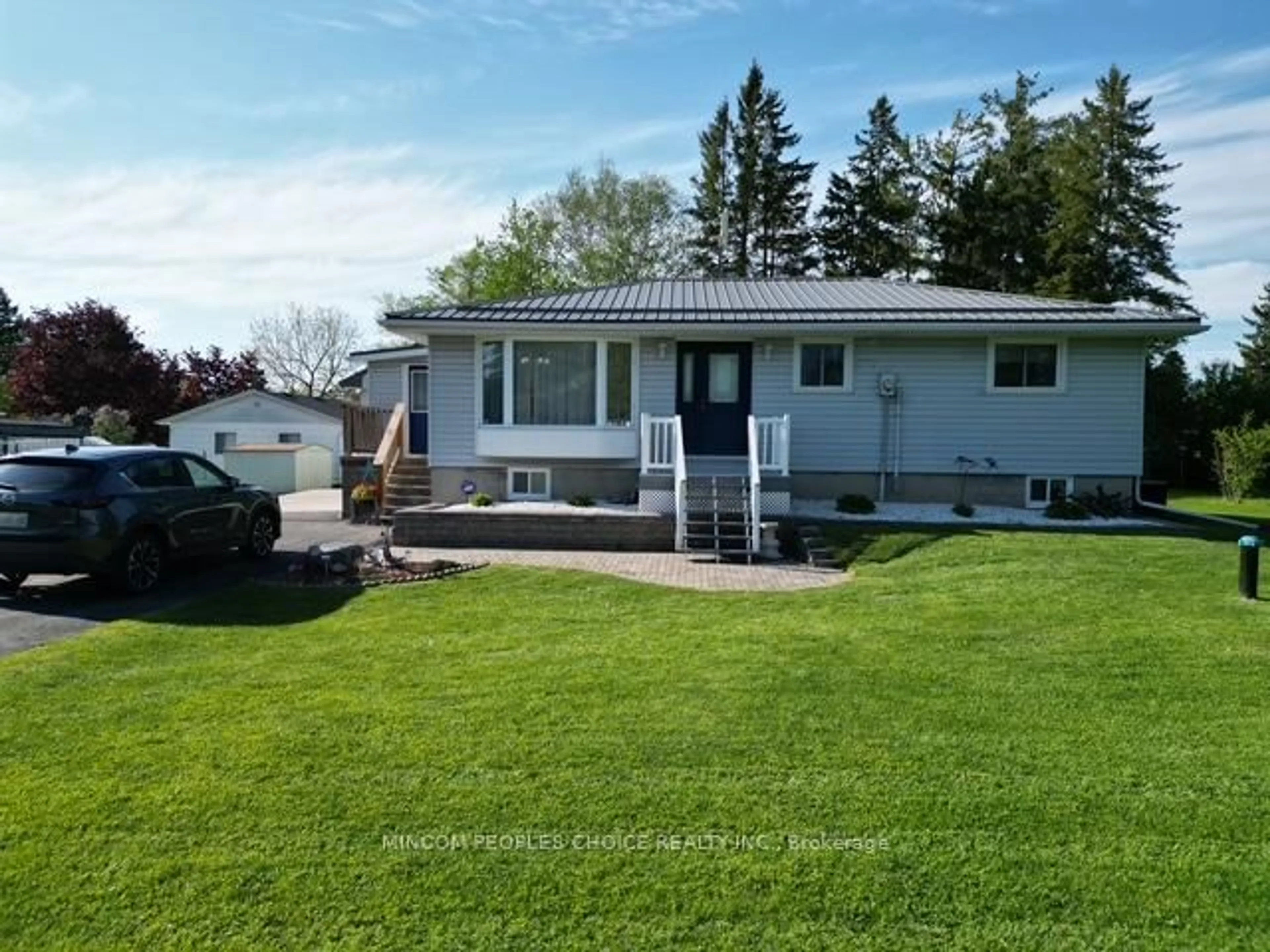A pic from outside/outdoor area/front of a property/back of a property/a pic from drone, unknown for 5 Emily Crt, Kawartha Lakes Ontario K0L 2W0