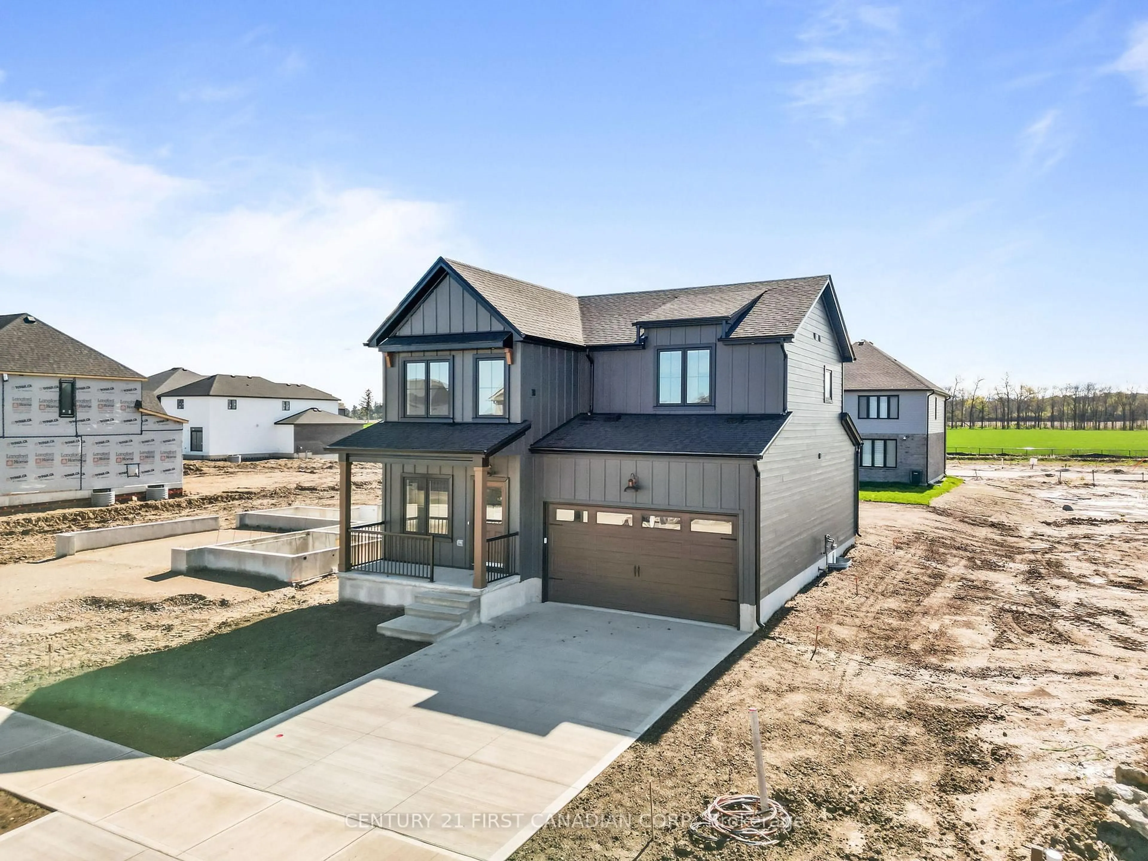 Home with brick exterior material, street for 30 Sheldabren St, North Middlesex Ontario N0M 1A0