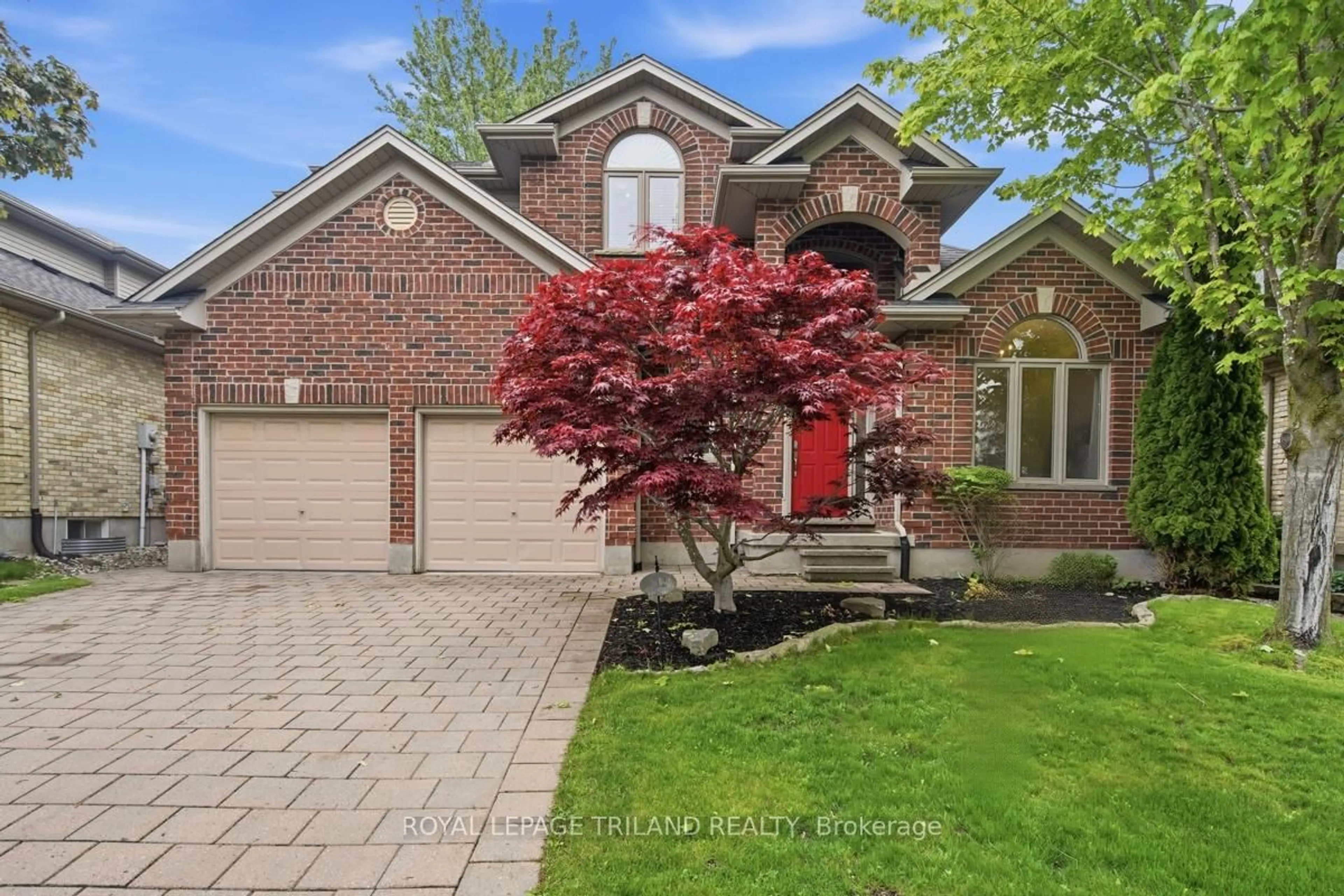 Home with brick exterior material, street for 512 Sandybrook Dr, London North Ontario N5X 4H1