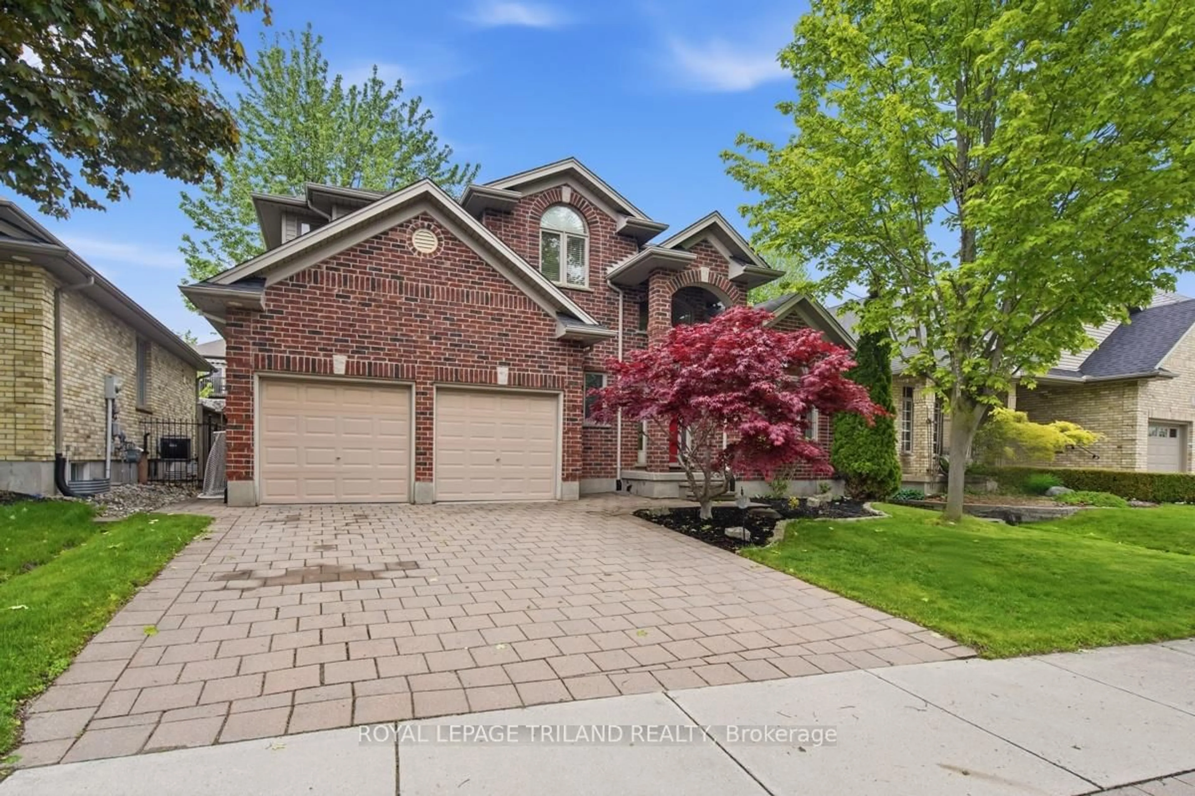 Home with brick exterior material, street for 512 Sandybrook Dr, London North Ontario N5X 4H1