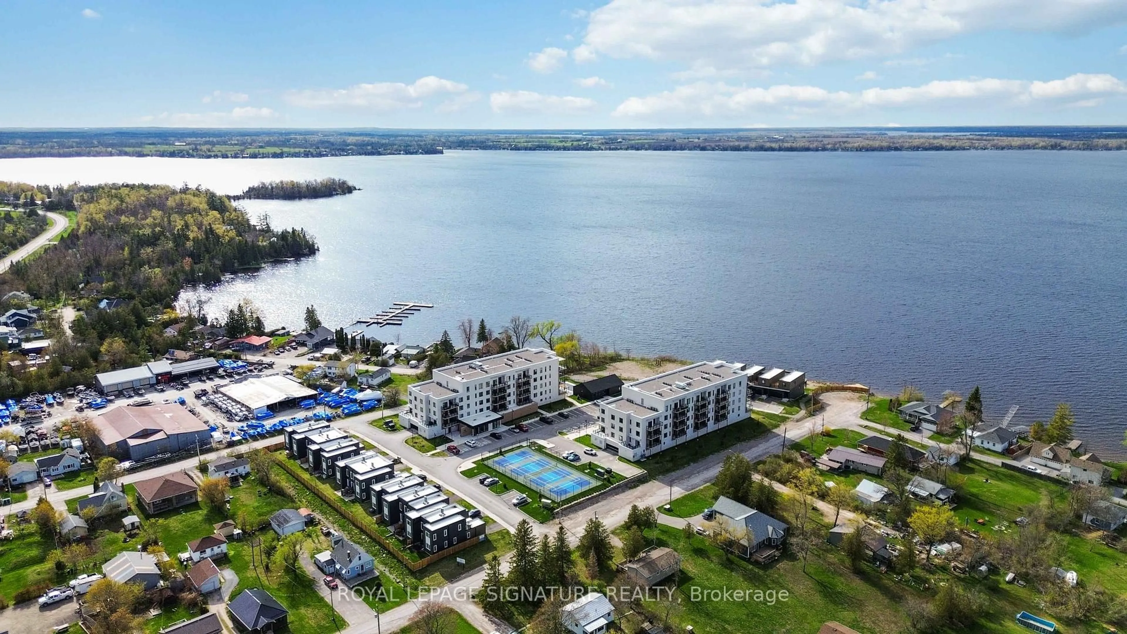 A pic from outside/outdoor area/front of a property/back of a property/a pic from drone, water/lake/river/ocean view for 19B West St #303, Kawartha Lakes Ontario K0M 1N0