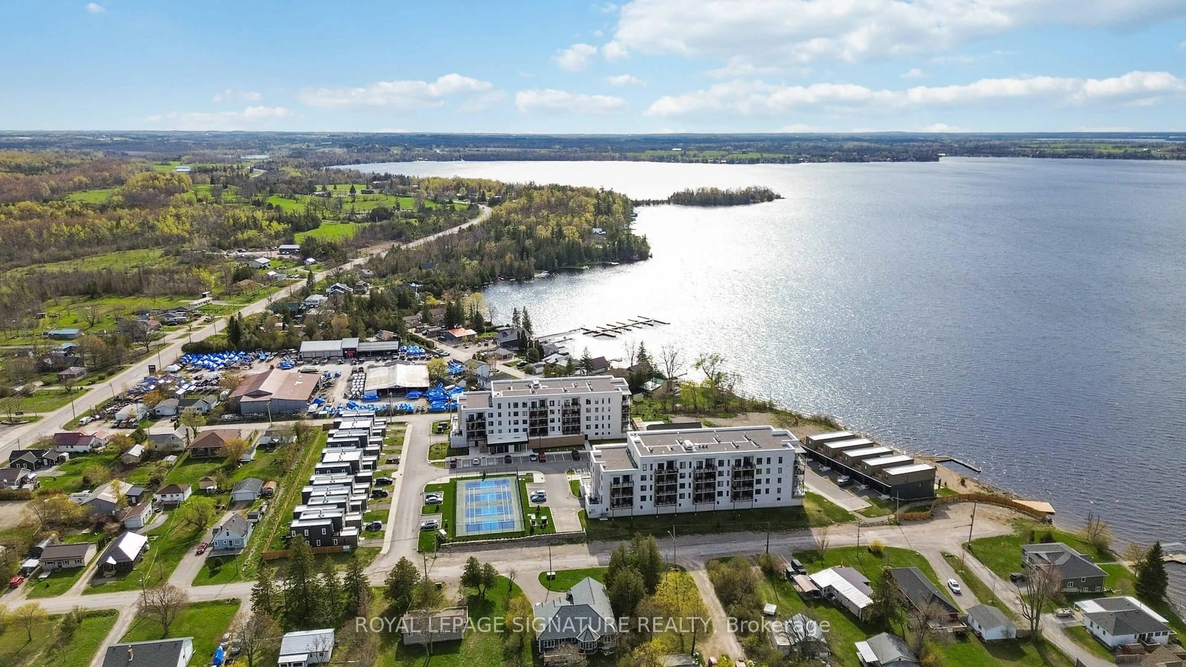 A pic from outside/outdoor area/front of a property/back of a property/a pic from drone, water/lake/river/ocean view for 19B West St #303, Kawartha Lakes Ontario K0M 1N0
