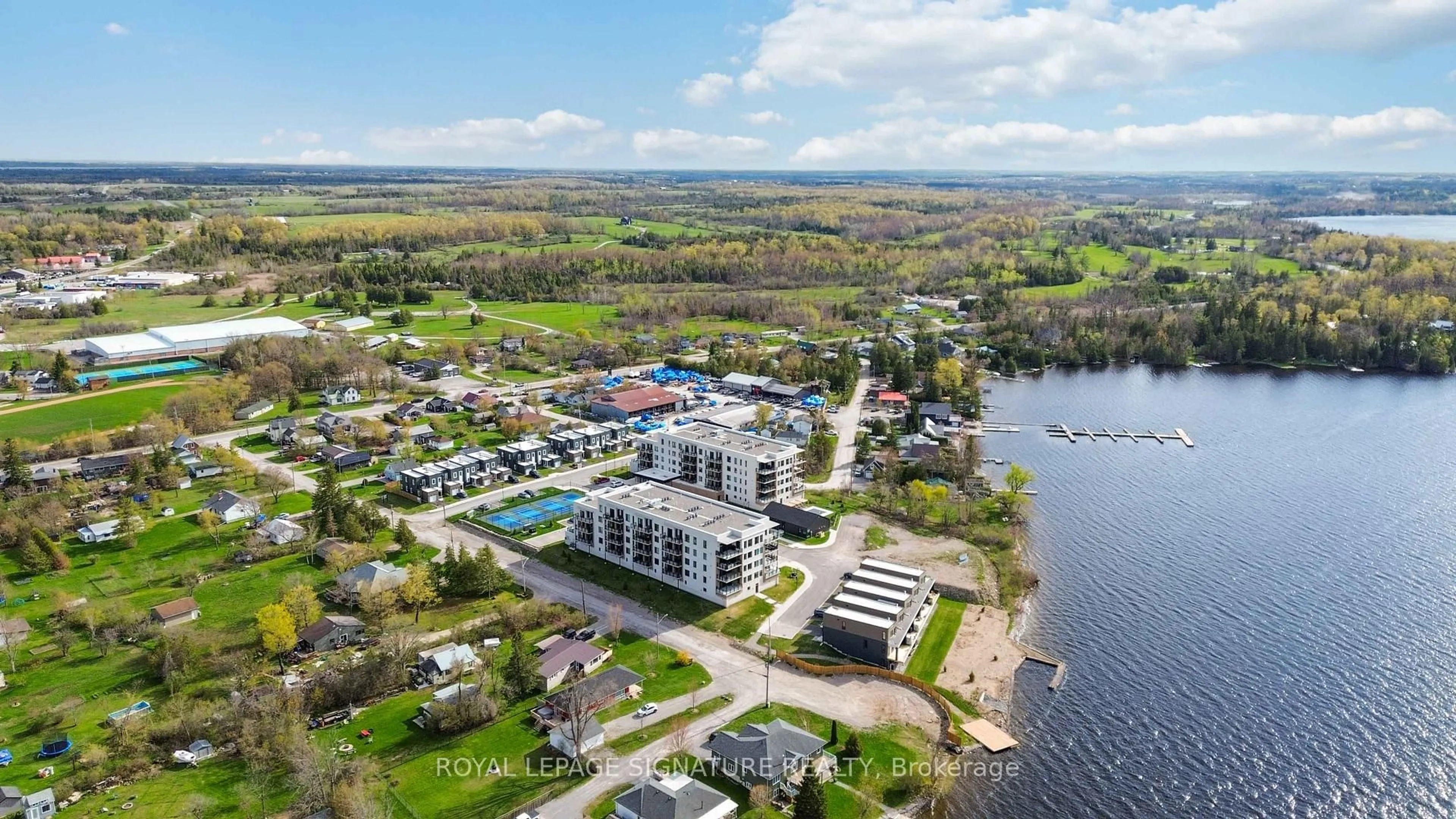 A pic from outside/outdoor area/front of a property/back of a property/a pic from drone, water/lake/river/ocean view for 19B West St #303, Kawartha Lakes Ontario K0M 1N0