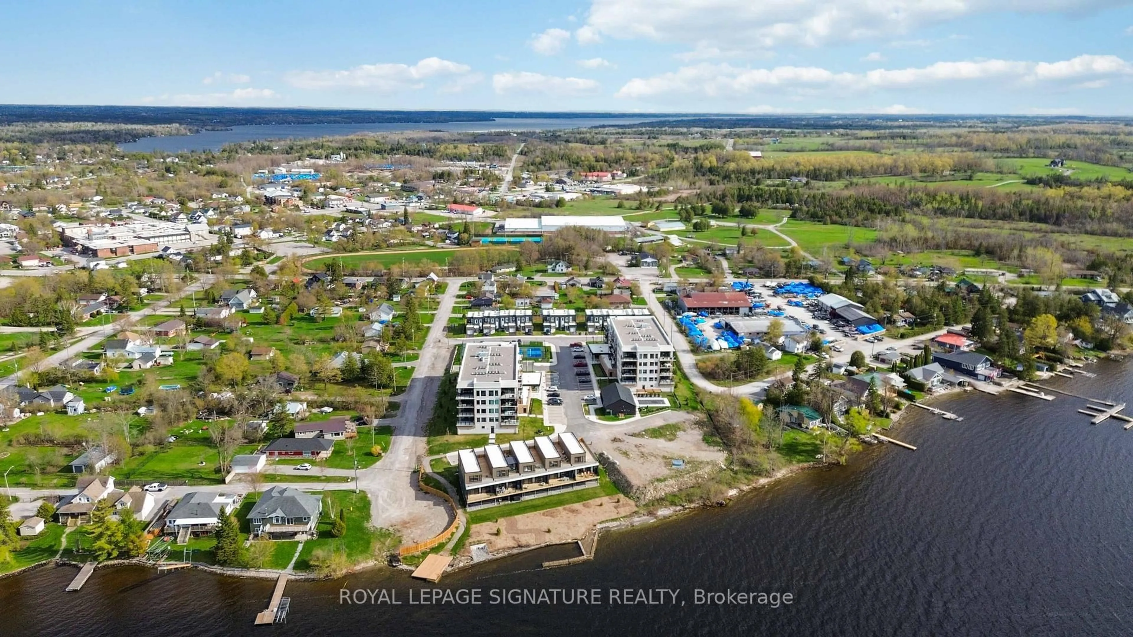 A pic from outside/outdoor area/front of a property/back of a property/a pic from drone, water/lake/river/ocean view for 19B West St #303, Kawartha Lakes Ontario K0M 1N0