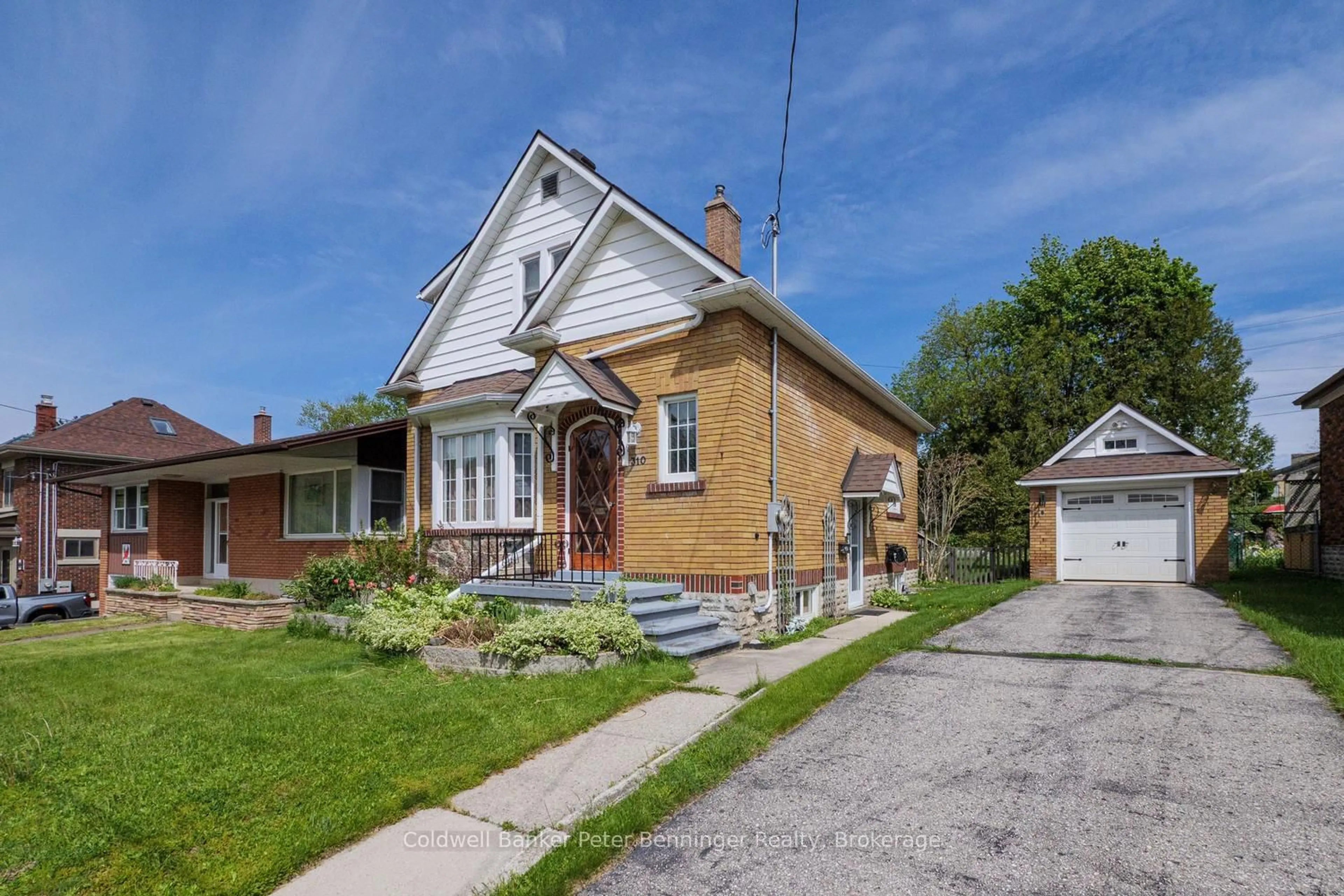 Home with brick exterior material, street for 310 9th St, Hanover Ontario N4N 1L4