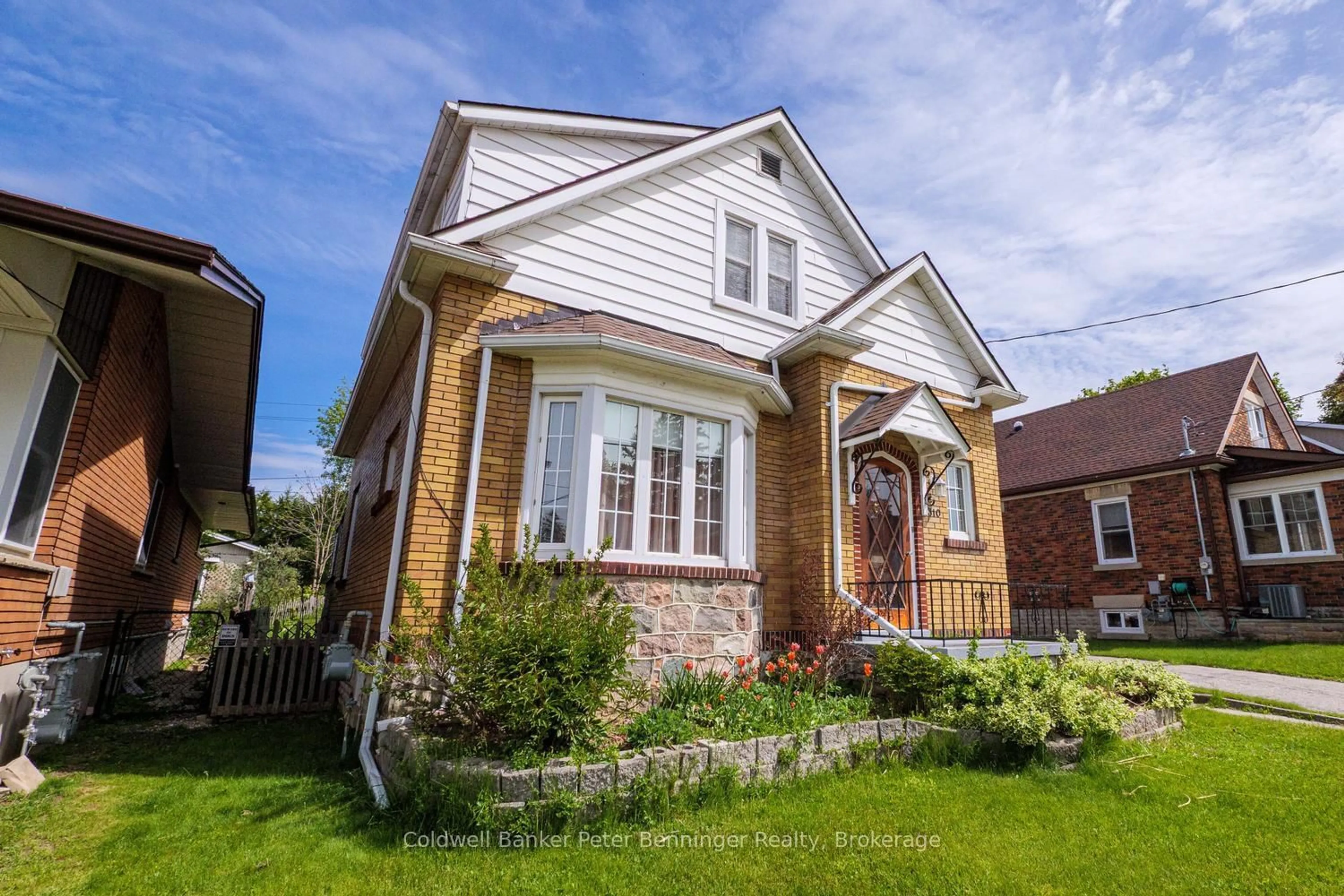 Home with brick exterior material, street for 310 9th St, Hanover Ontario N4N 1L4