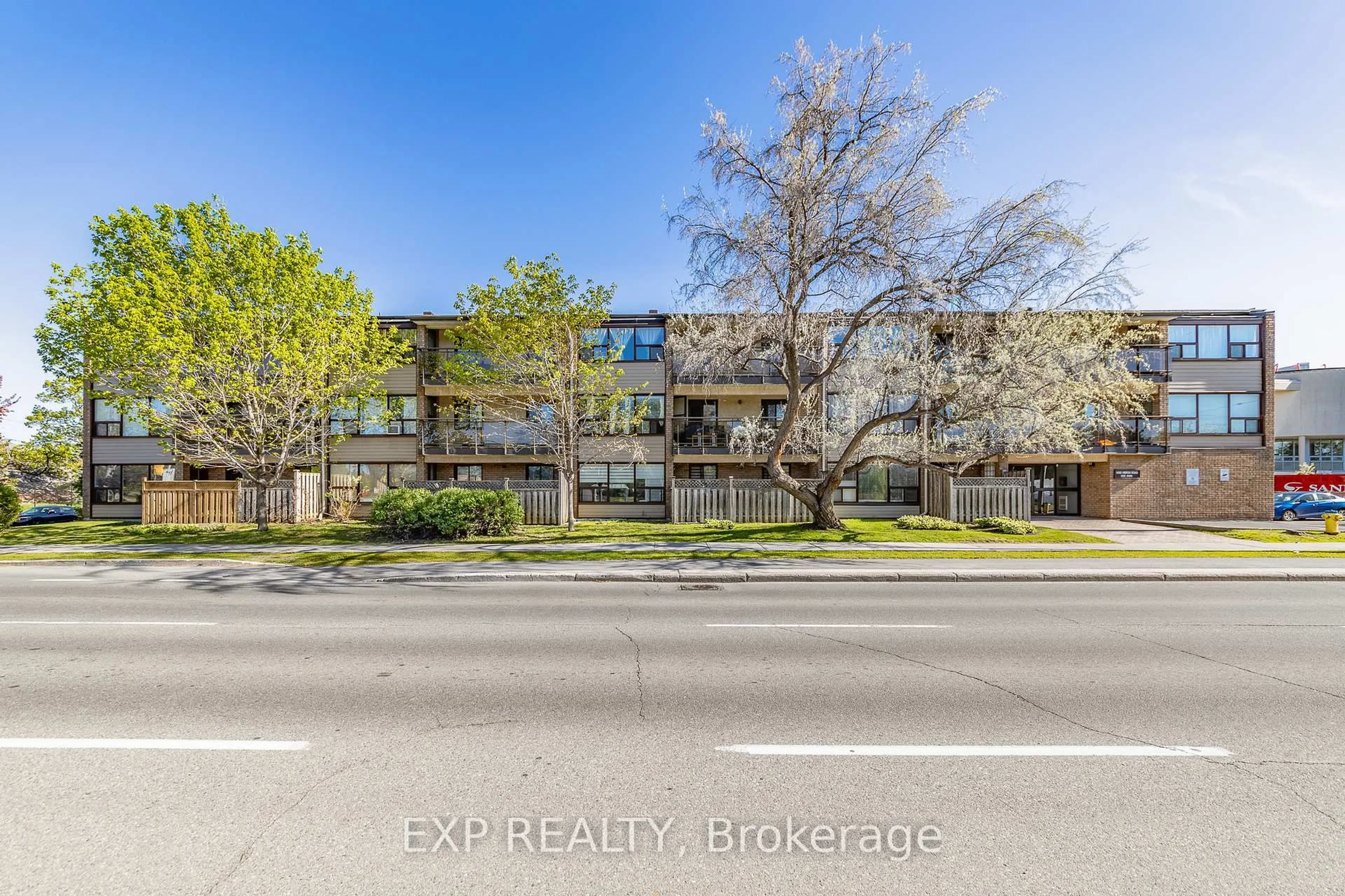 A pic from outside/outdoor area/front of a property/back of a property/a pic from drone, building for 1490 Heron Rd #305, Ottawa Ontario K1V 6A5