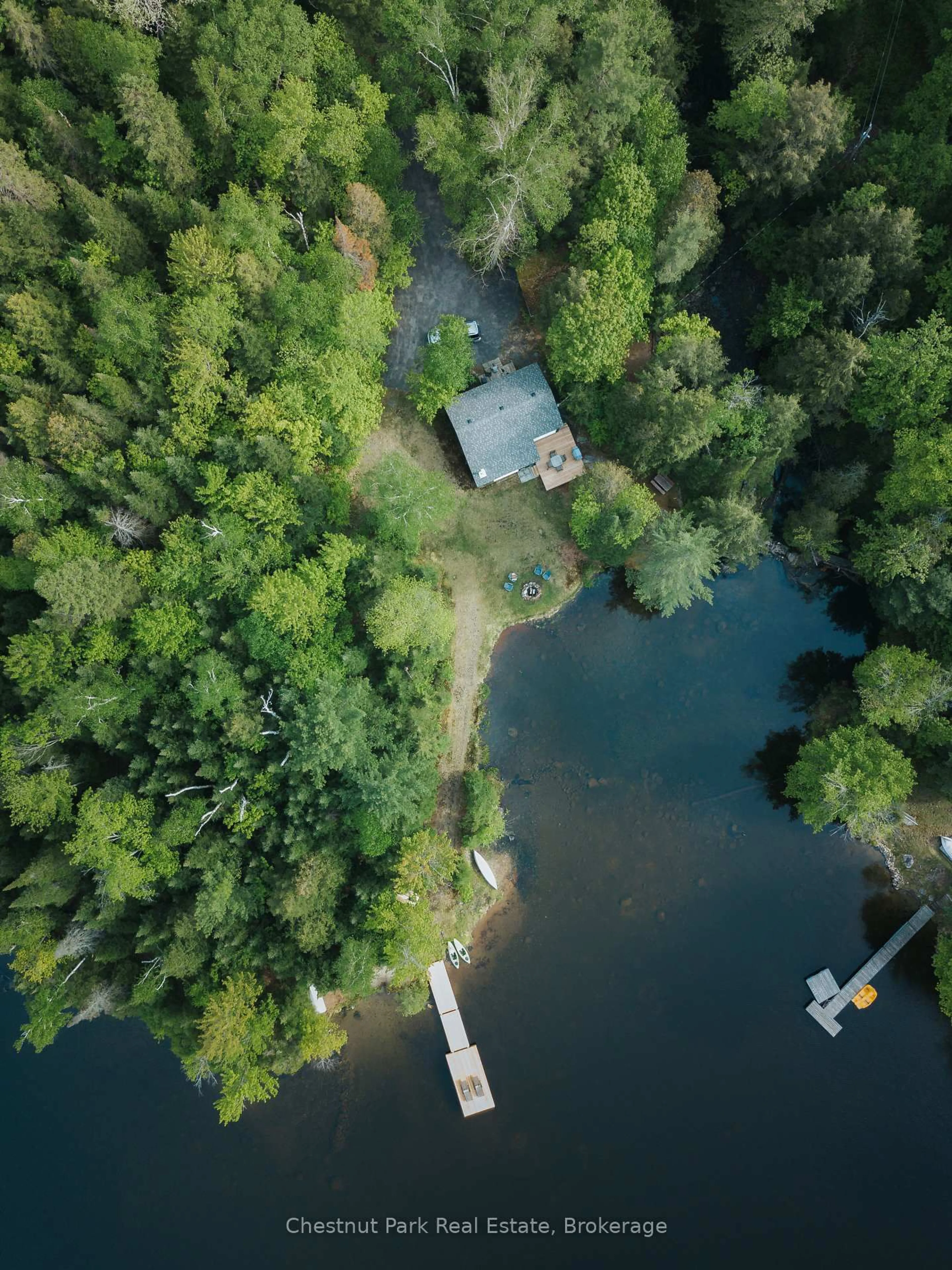 A pic from outside/outdoor area/front of a property/back of a property/a pic from drone, water/lake/river/ocean view for 1097 Bay Lake Rd, Perry Ontario P0A 1J0