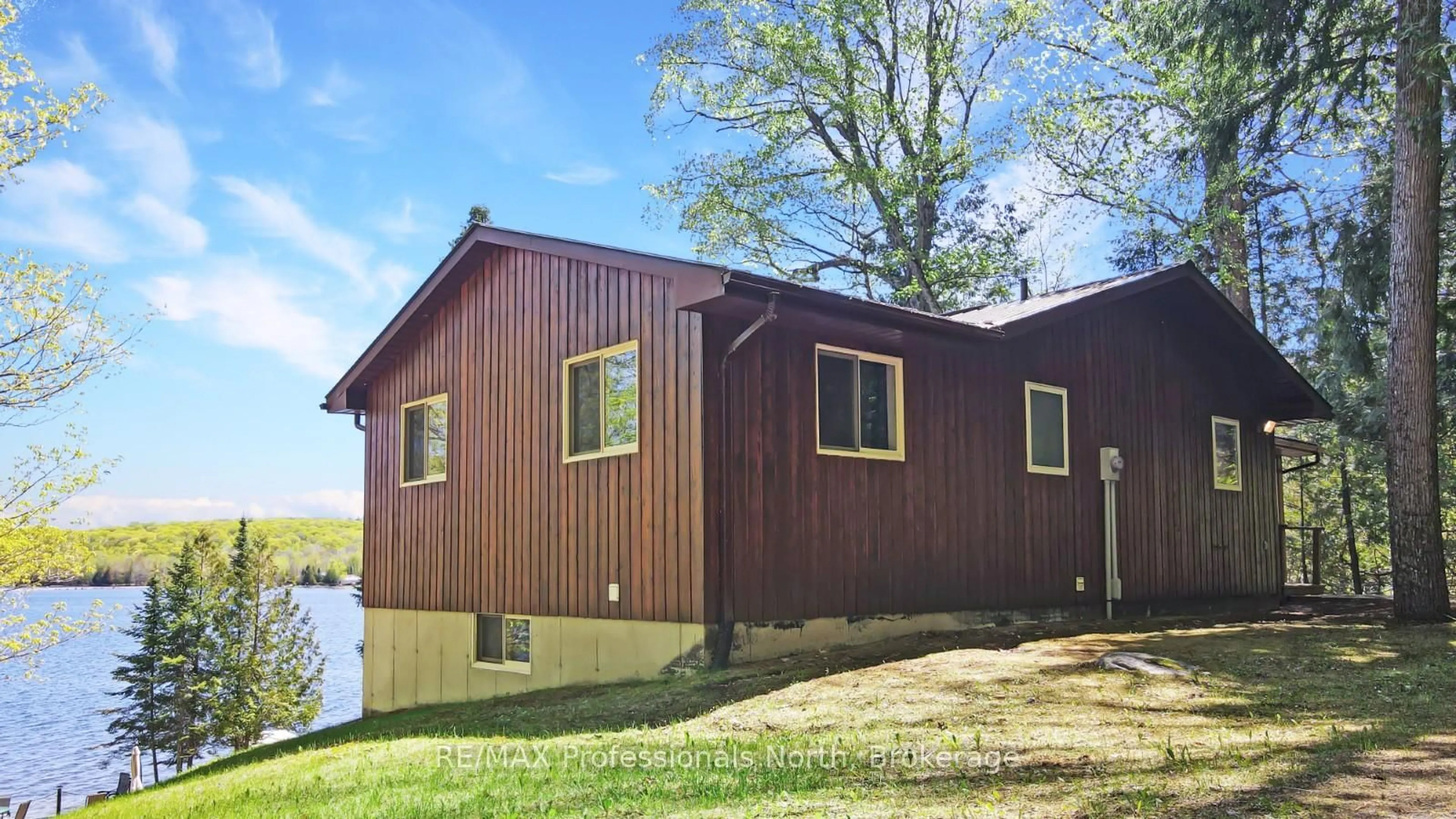 Home with vinyl exterior material, water/lake/river/ocean view for 1149 Harrison Bay Lane, Minden Hills Ontario K0M 2K0
