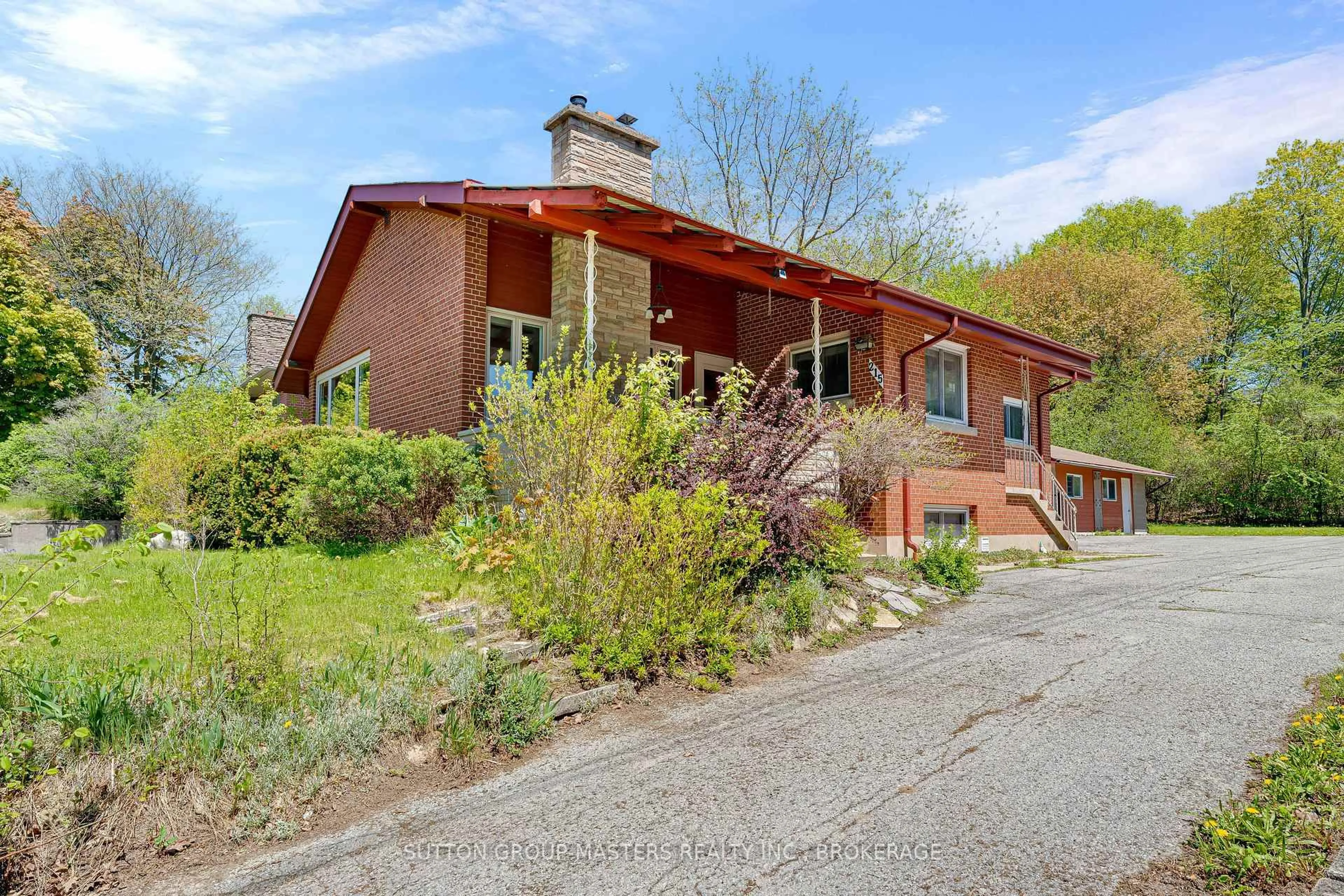 Home with brick exterior material, street for 215 Yonge St, Kingston Ontario K7M 1G2