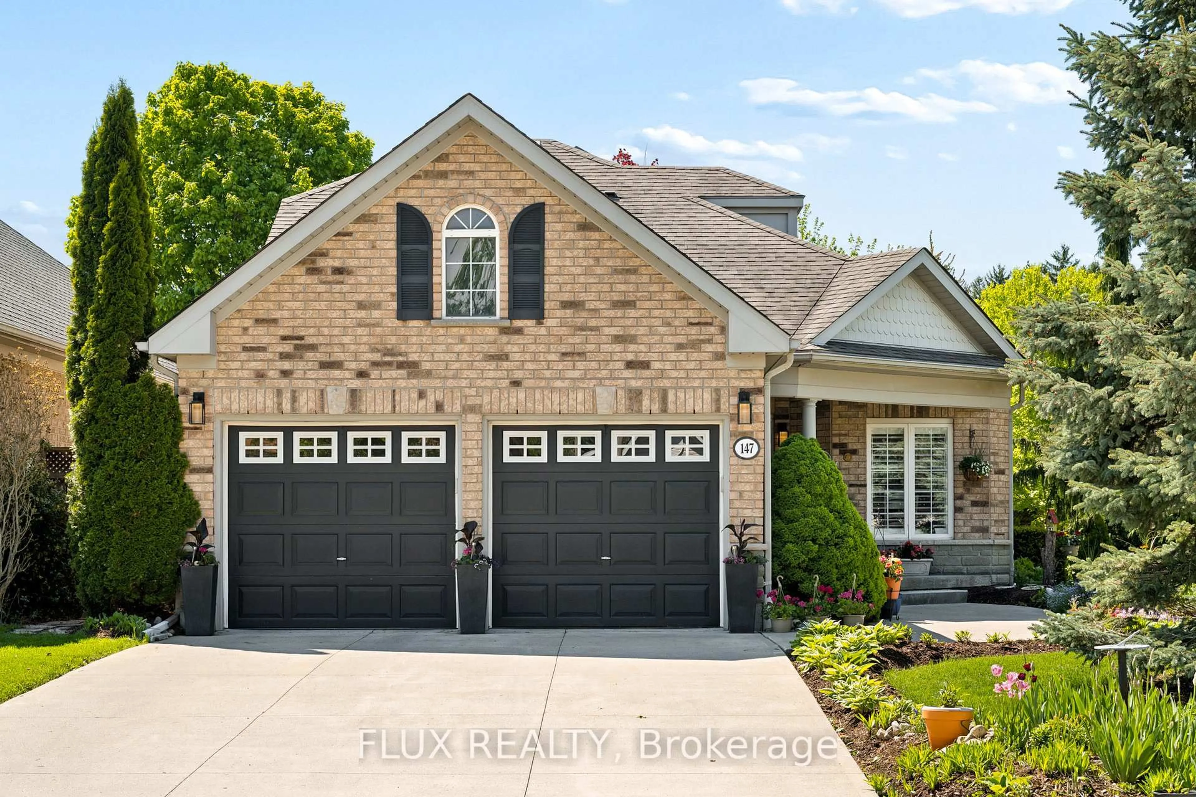 Home with brick exterior material, street for 147 Reiber Crt, Waterloo Ontario N2L 6N2