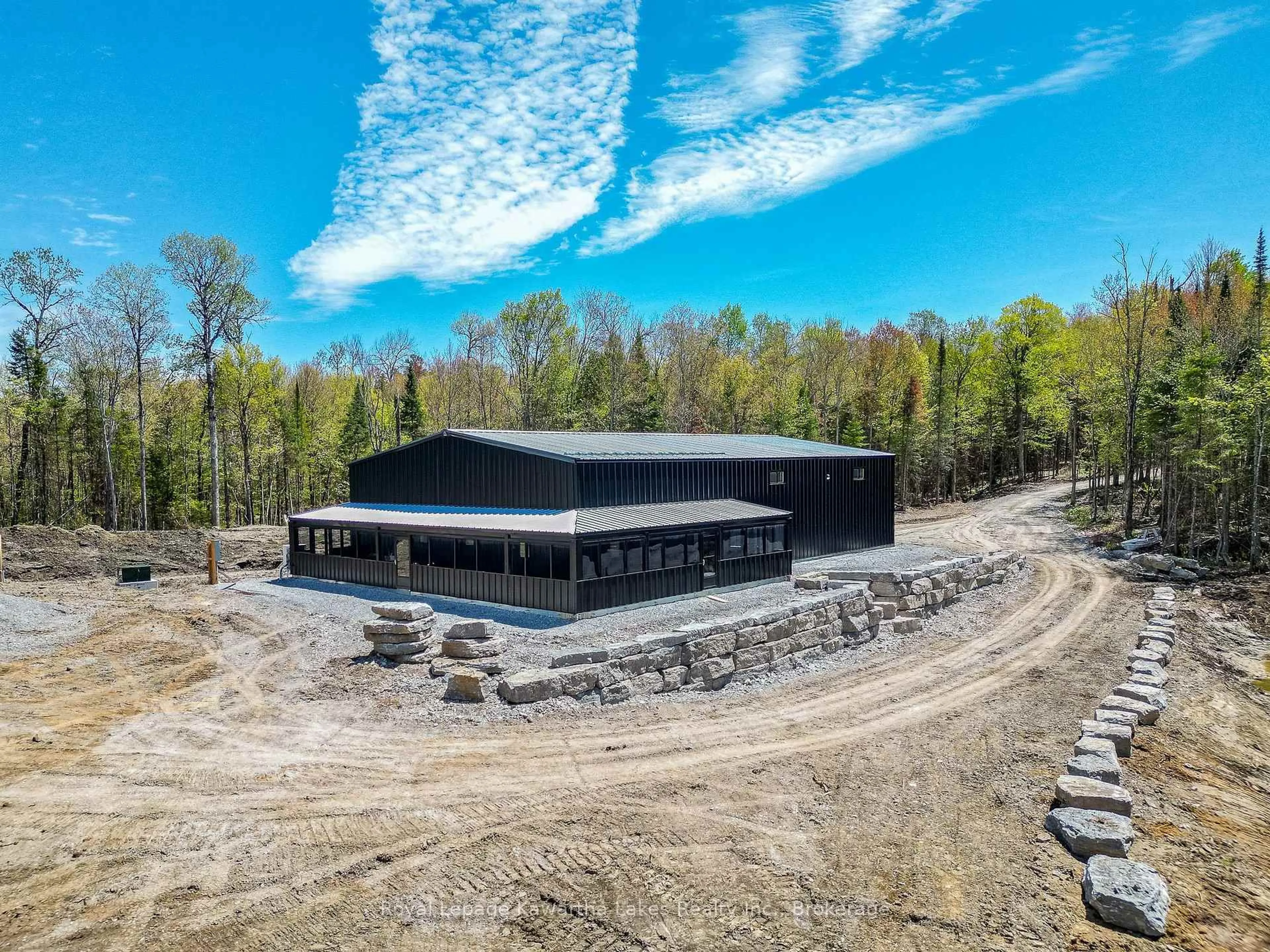 A pic from outside/outdoor area/front of a property/back of a property/a pic from drone, building for 1851 Contau Lake Rd, Highlands East Ontario K0M 1R0