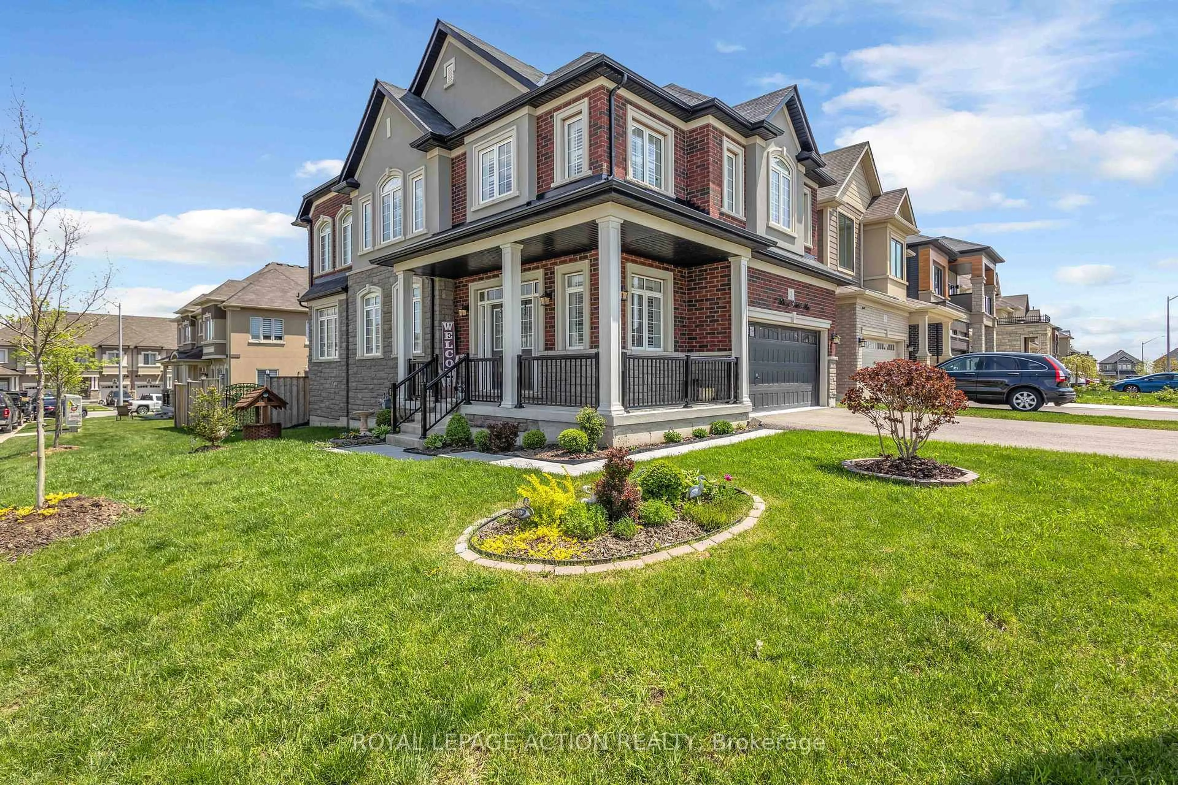 Home with brick exterior material, street for 2 Doug Foulds Way, Brant Ontario N3L 0K2