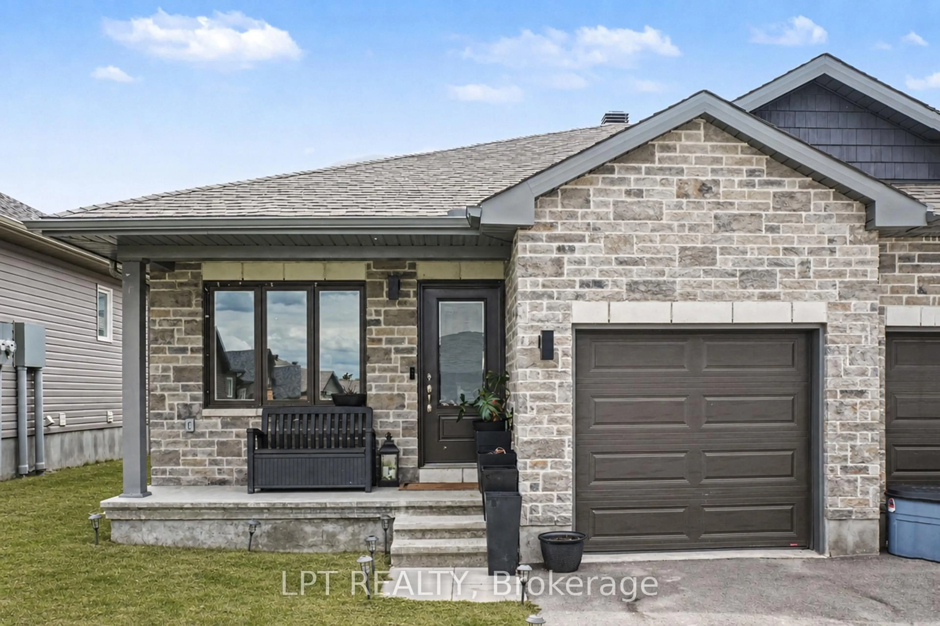 Home with brick exterior material, street for 34 Morgan Clouthier Way, Arnprior Ontario K7S 3M3