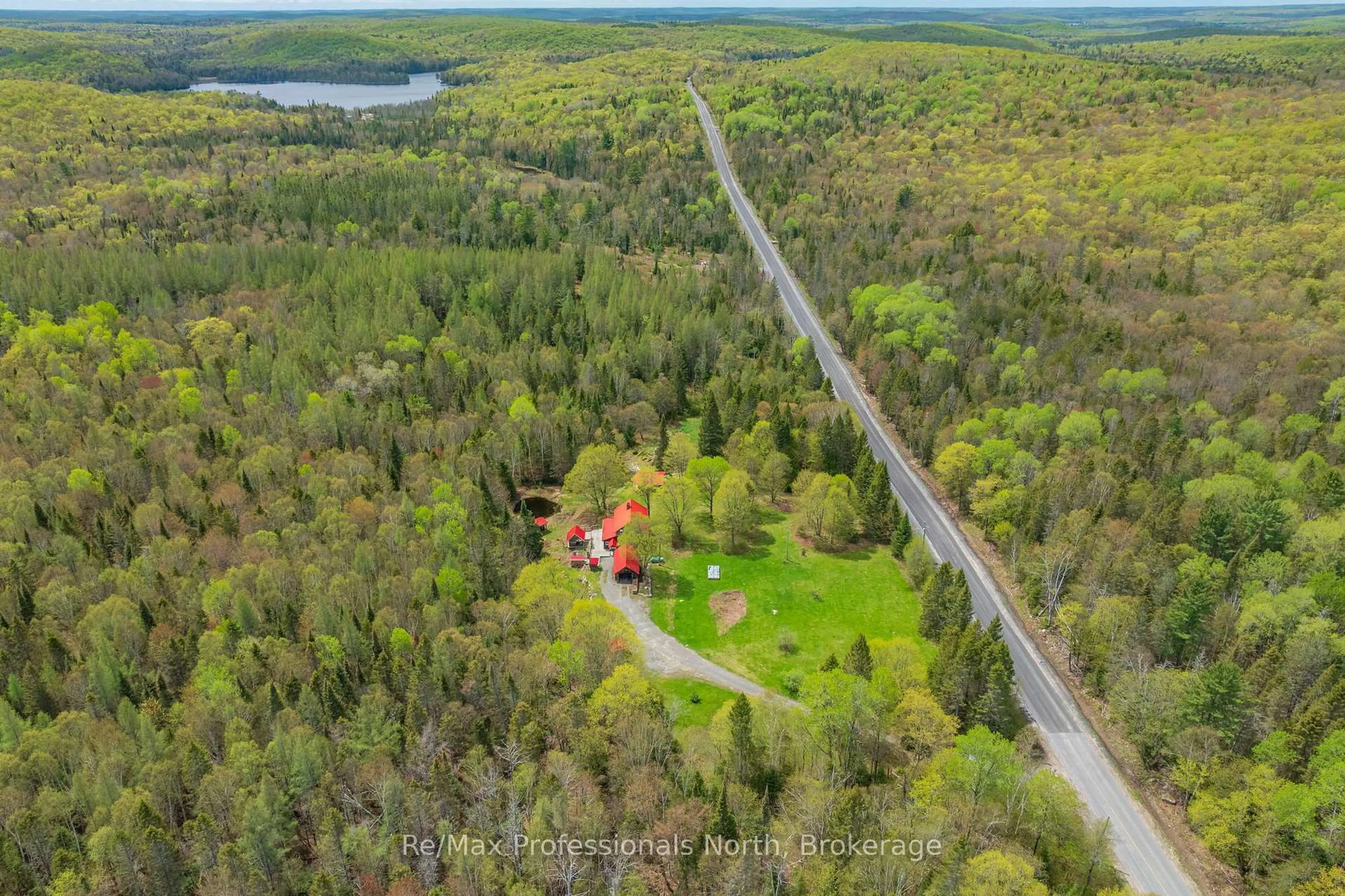 A pic from outside/outdoor area/front of a property/back of a property/a pic from drone, forest/trees view for 3569 Chetwynd Rd, Kearney Ontario P0A 1M0