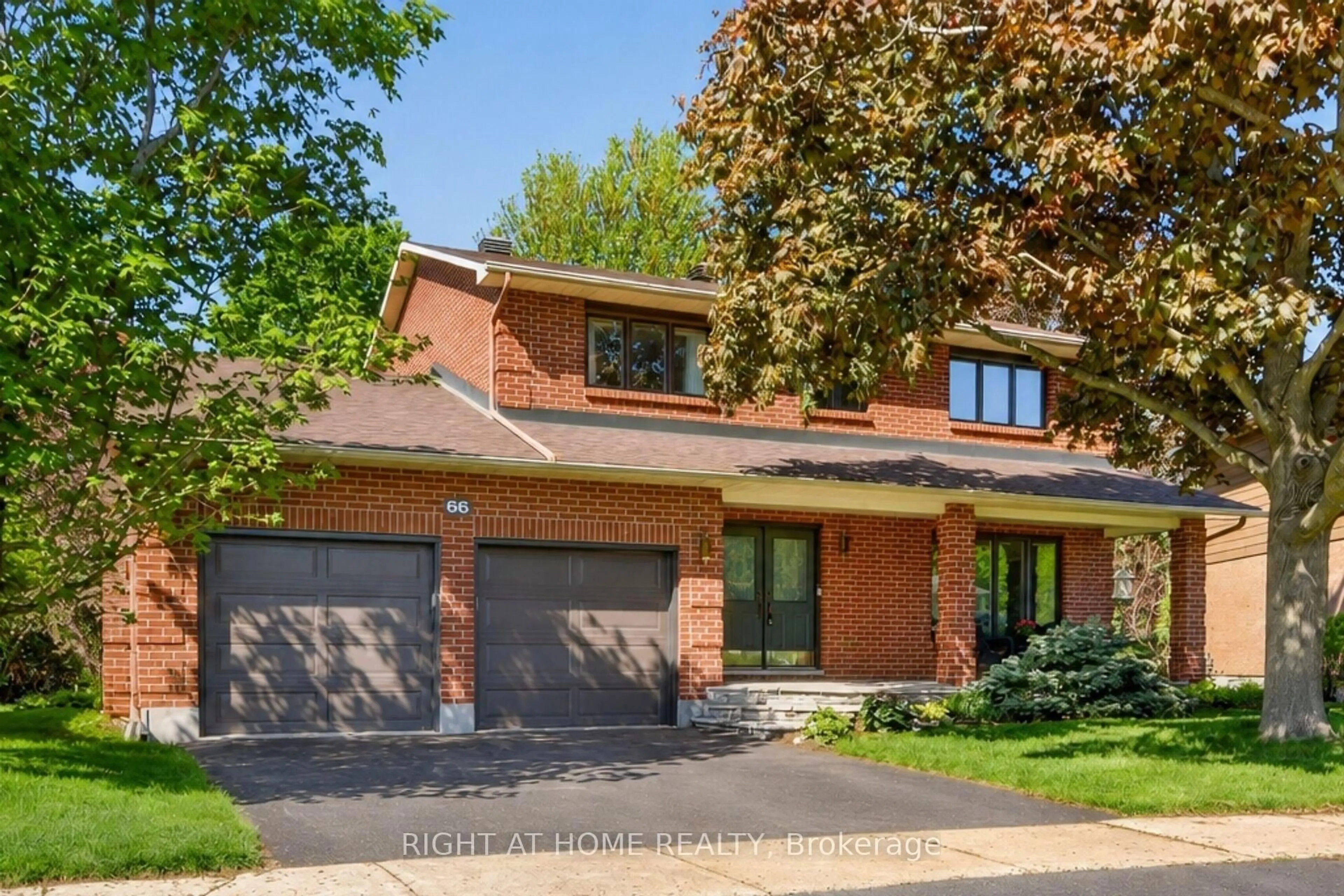 Home with brick exterior material, street for 66 Beechfern Dr, Stittsville Ontario K2S 1E3