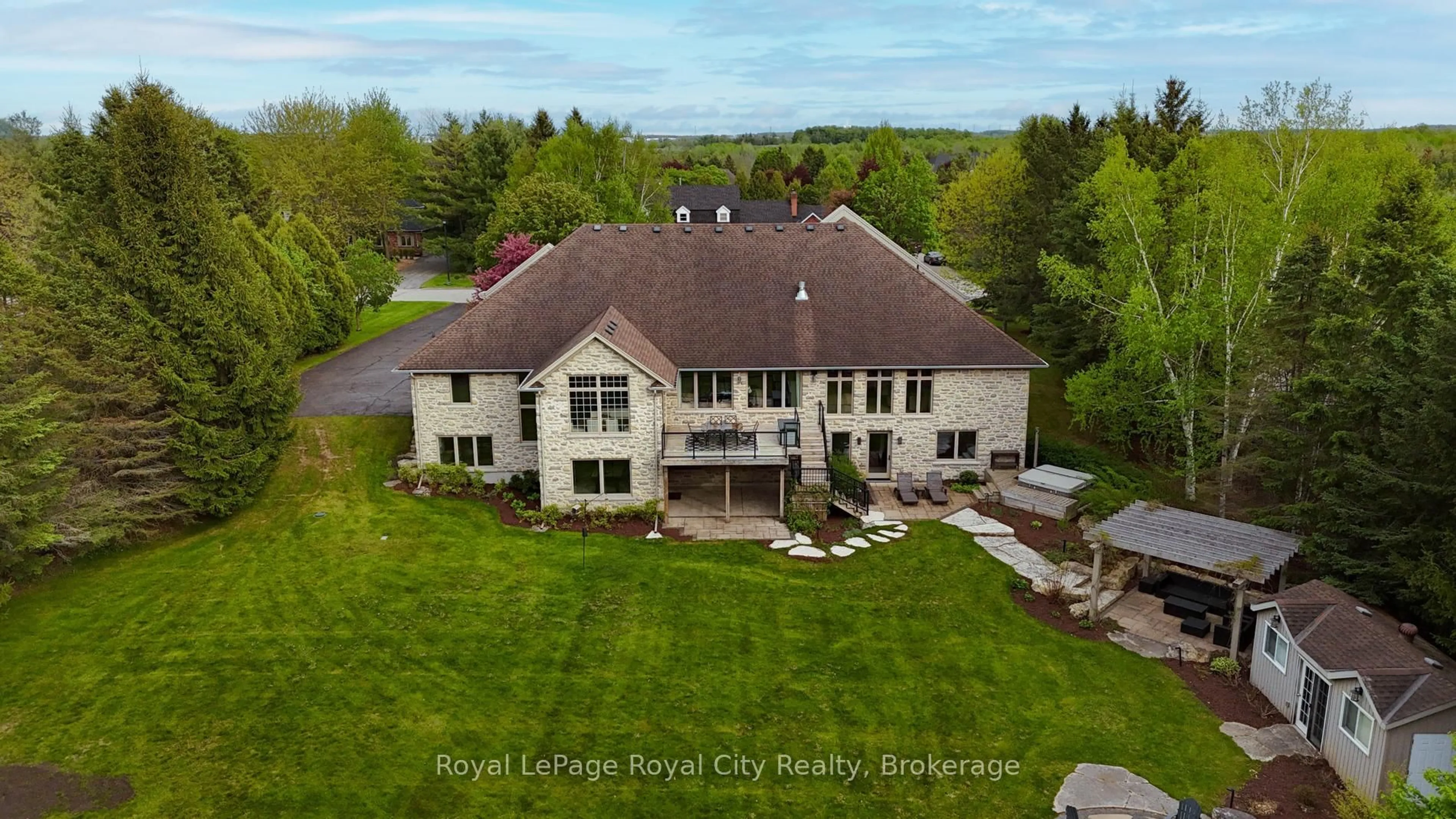 A pic from outside/outdoor area/front of a property/back of a property/a pic from drone, water/lake/river/ocean view for 54 Bridle Path, Puslinch Ontario N0B 2J0