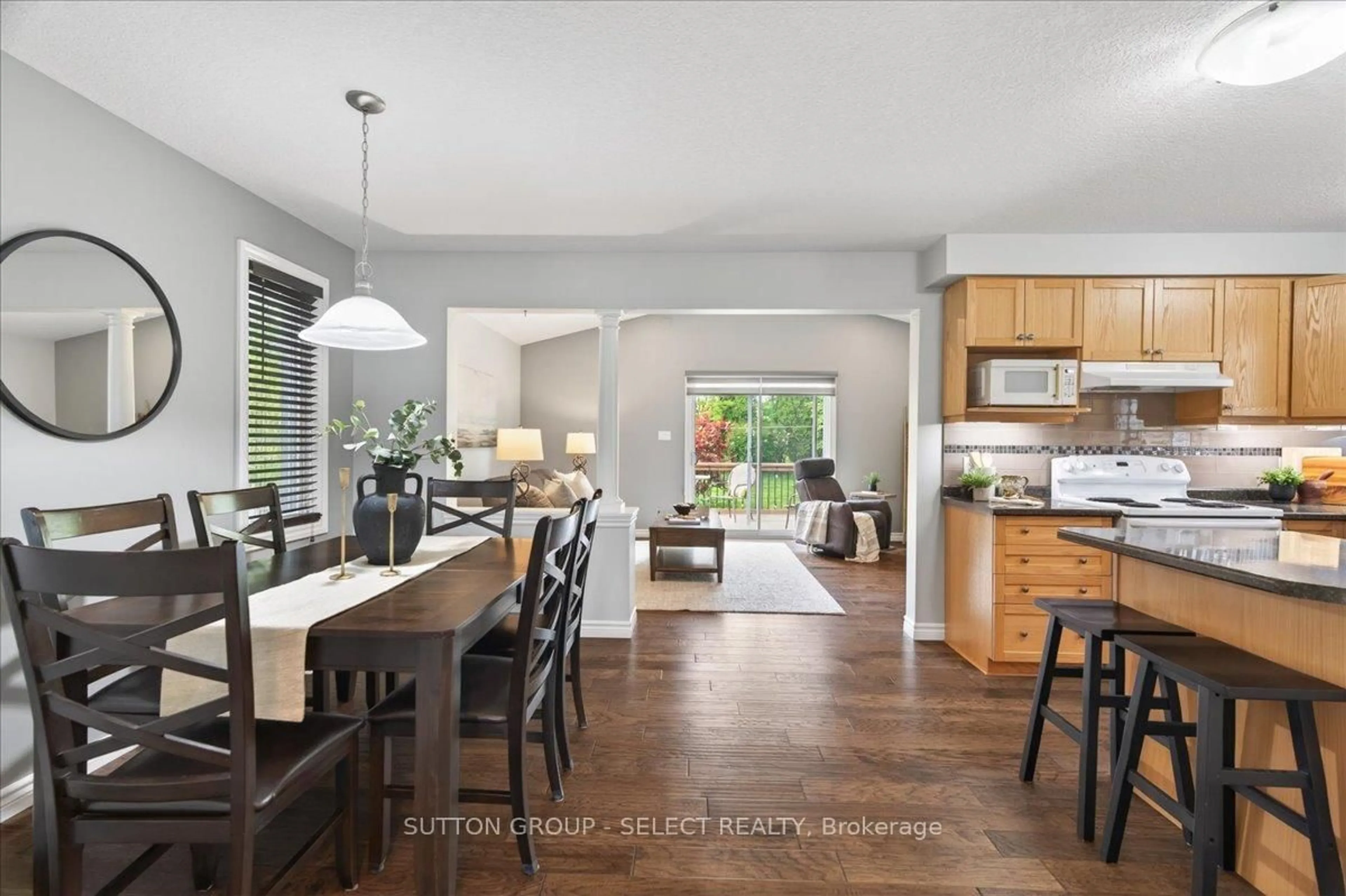 Open concept kitchen, wood/laminate floor for 106 Mcmahen St, London East Ontario N5Y 0A2