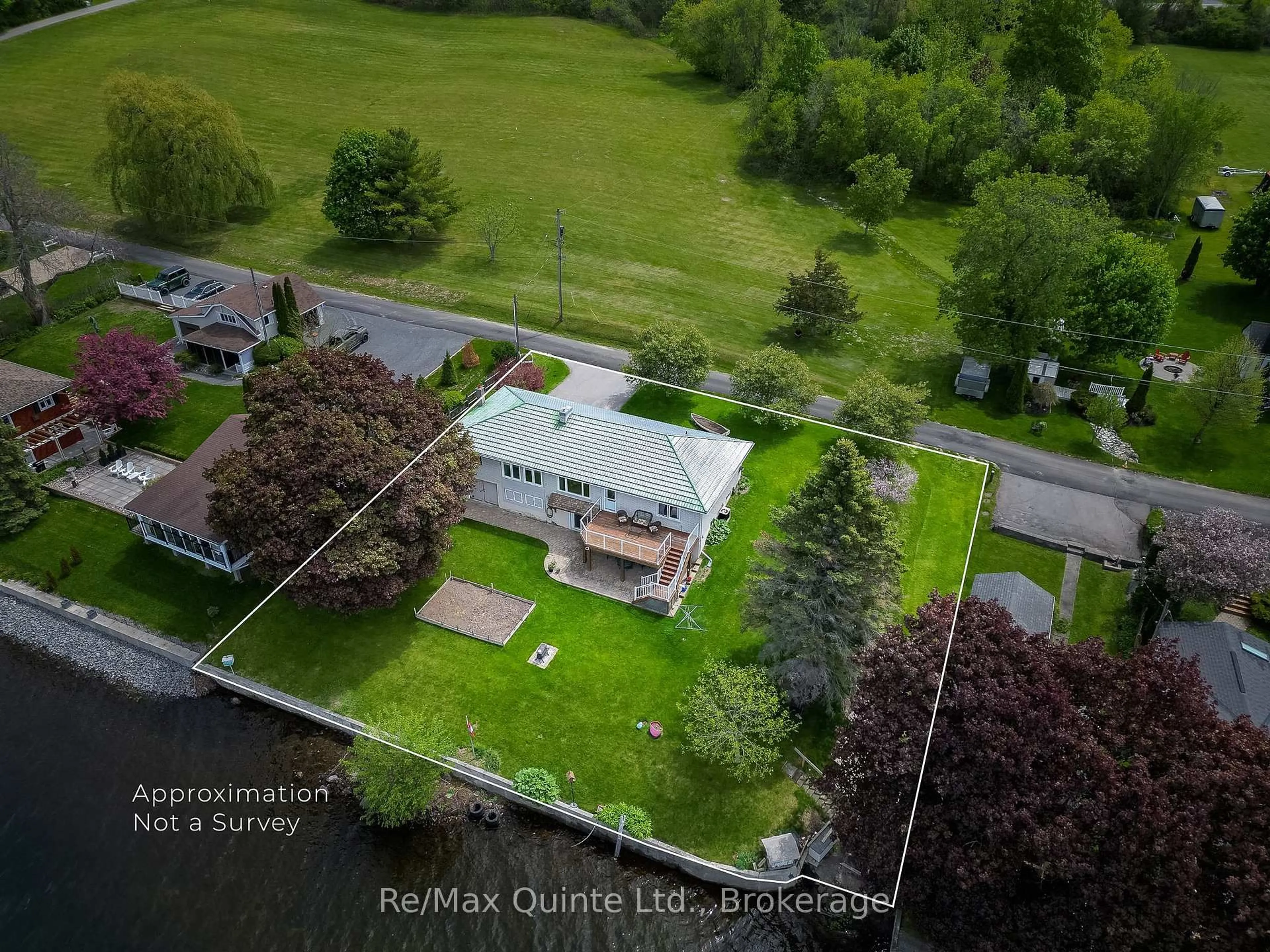 A pic from outside/outdoor area/front of a property/back of a property/a pic from drone, unknown for 54 Cedar Lane, Prince Edward County Ontario K0K 2T0