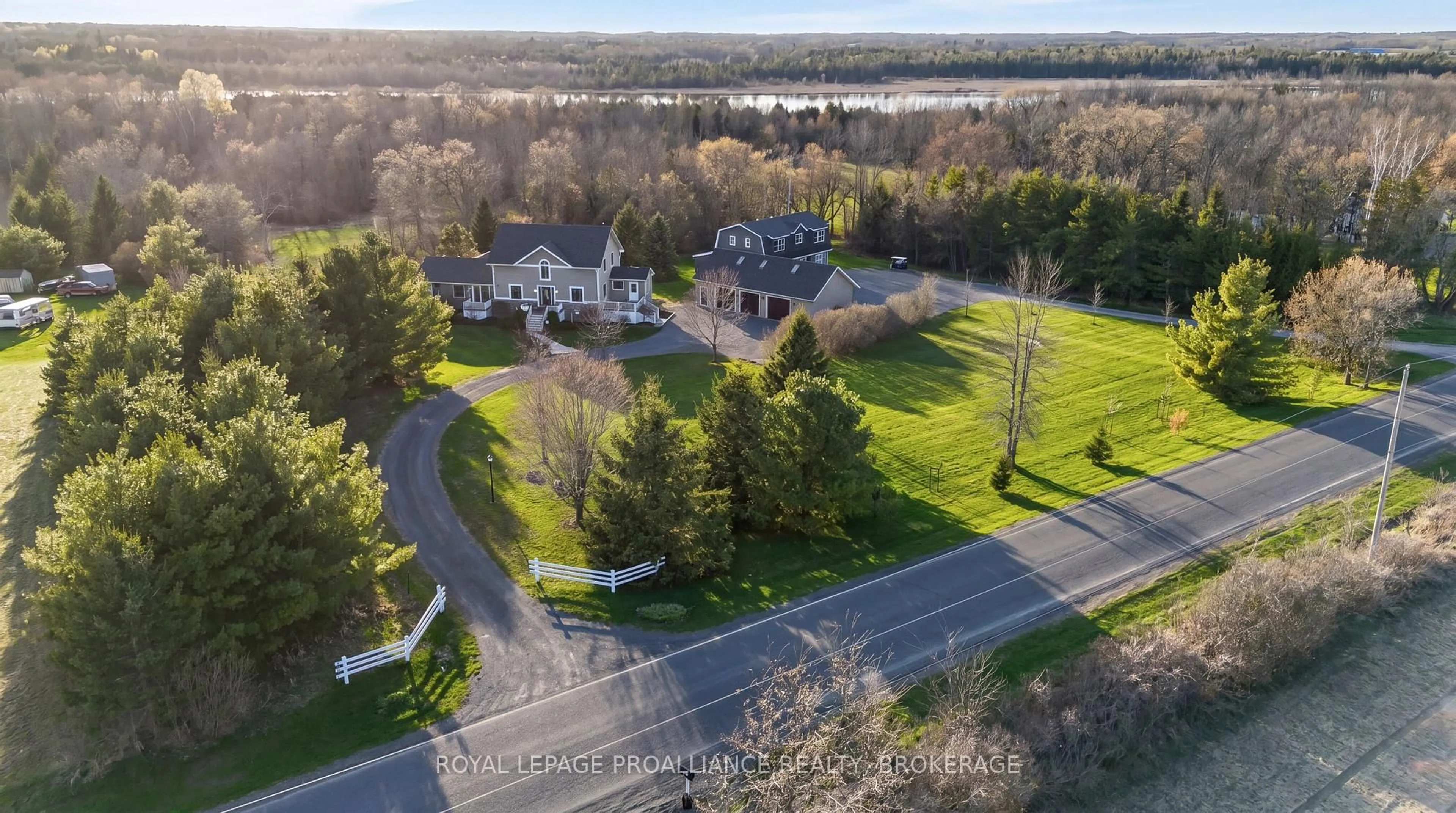 A pic from outside/outdoor area/front of a property/back of a property/a pic from drone, water/lake/river/ocean view for 2489 Quabbin Rd, Bissett Creek Ontario K0H 2H0