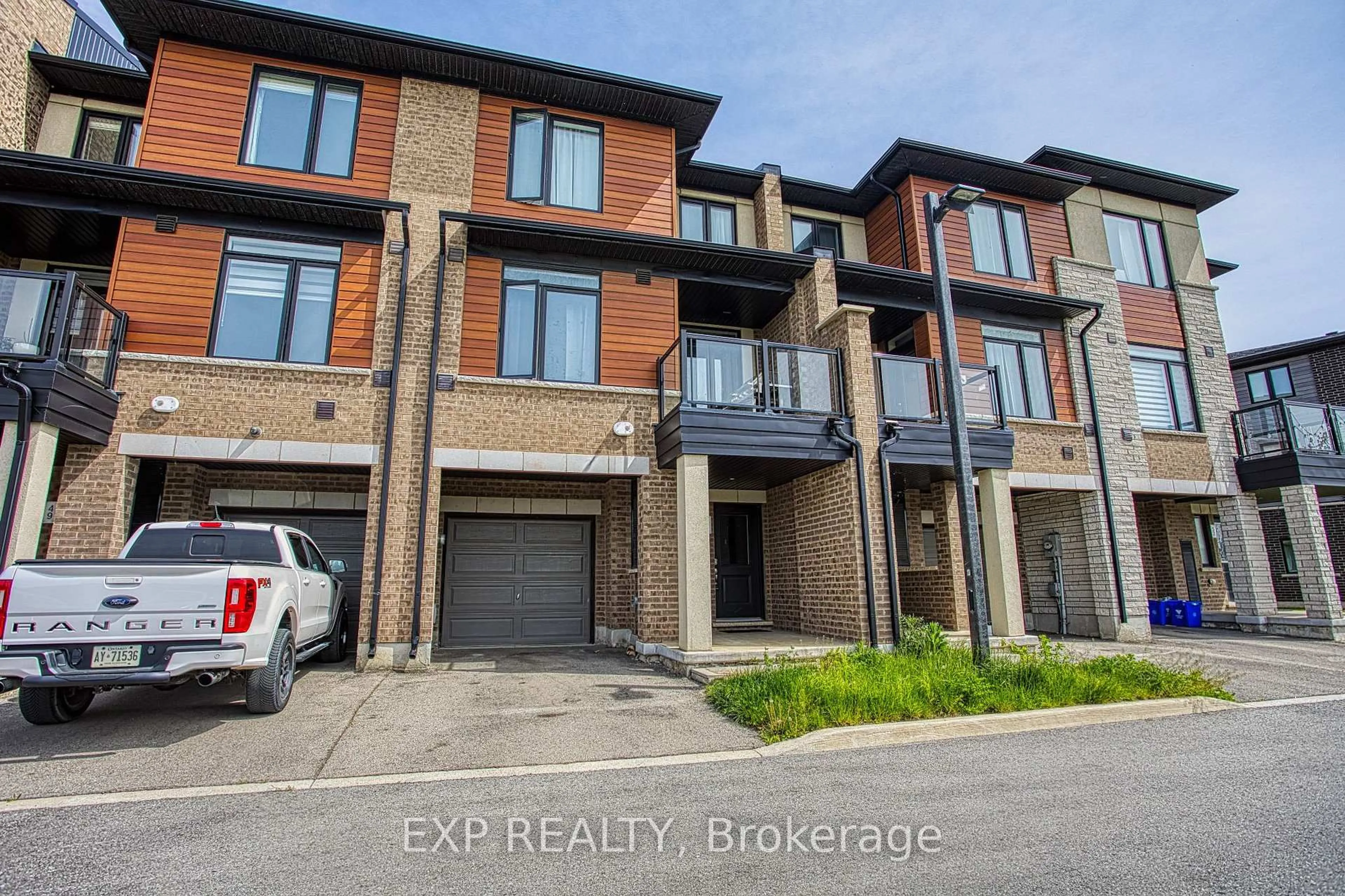 Home with brick exterior material, street for 590 North Service Rd #50, Hamilton Ontario L8E 0K5