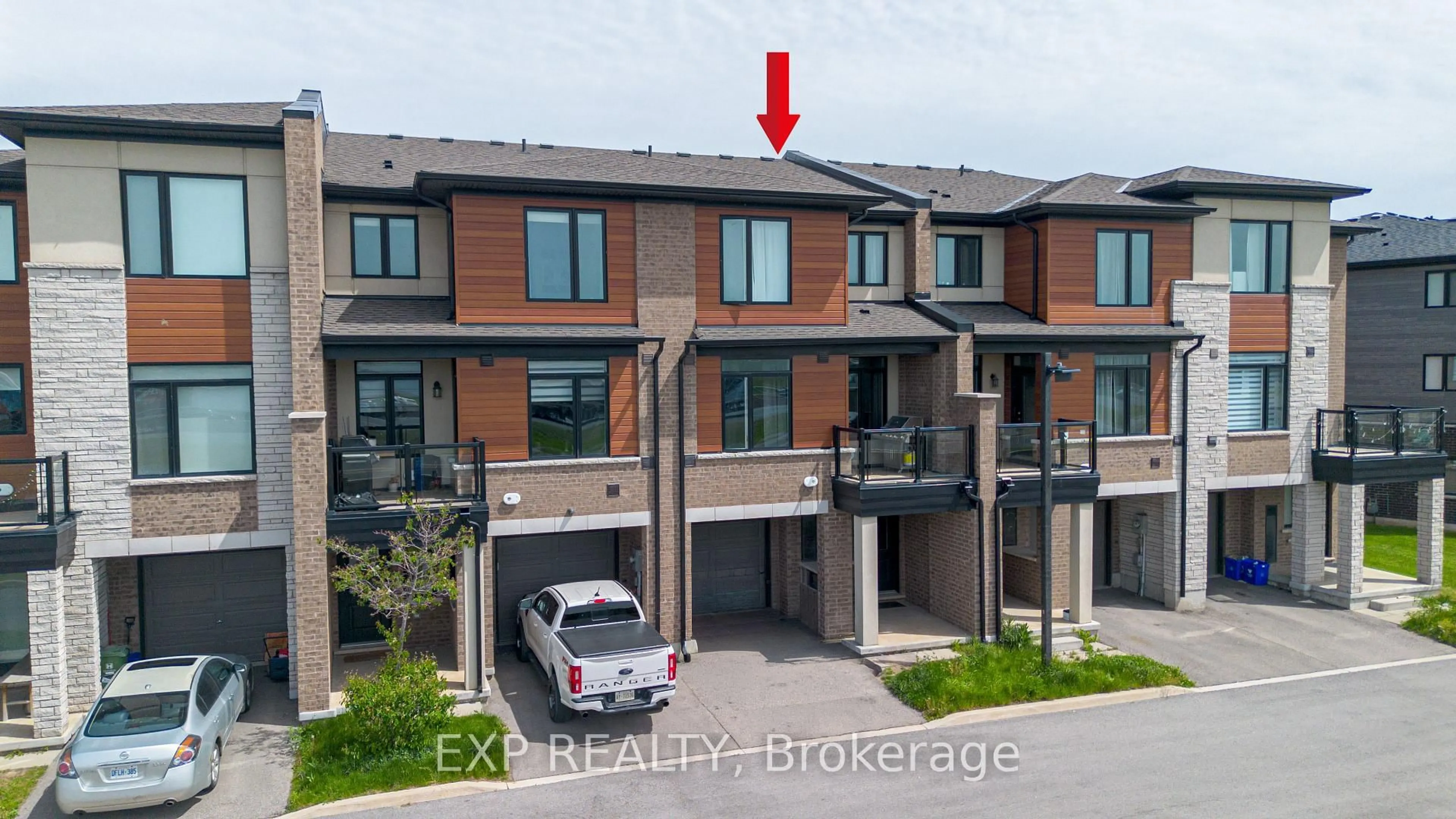 A pic from outside/outdoor area/front of a property/back of a property/a pic from drone, street for 590 North Service Rd #50, Hamilton Ontario L8E 0K5