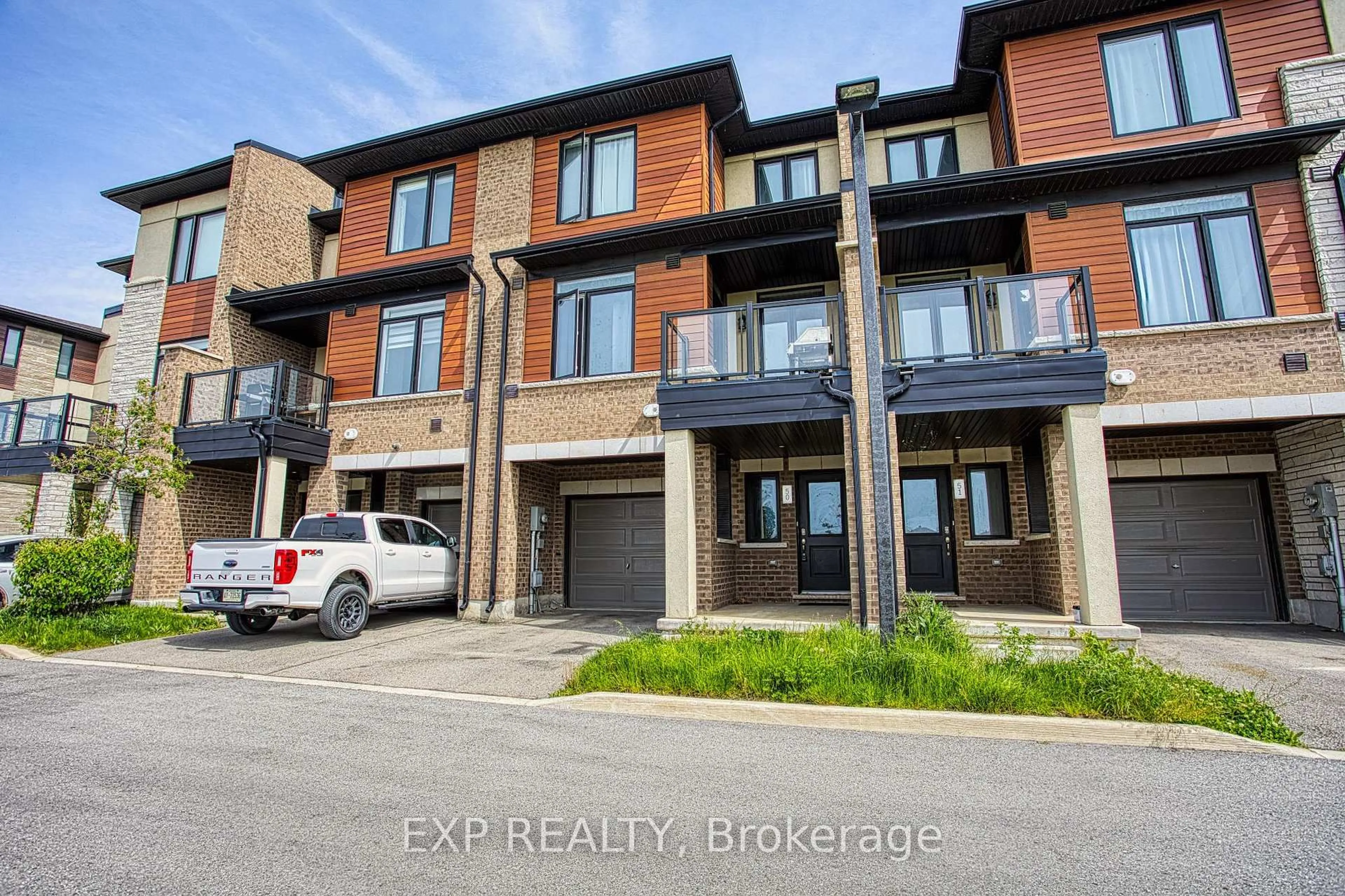 Home with brick exterior material, street for 590 North Service Rd #50, Hamilton Ontario L8E 0K5