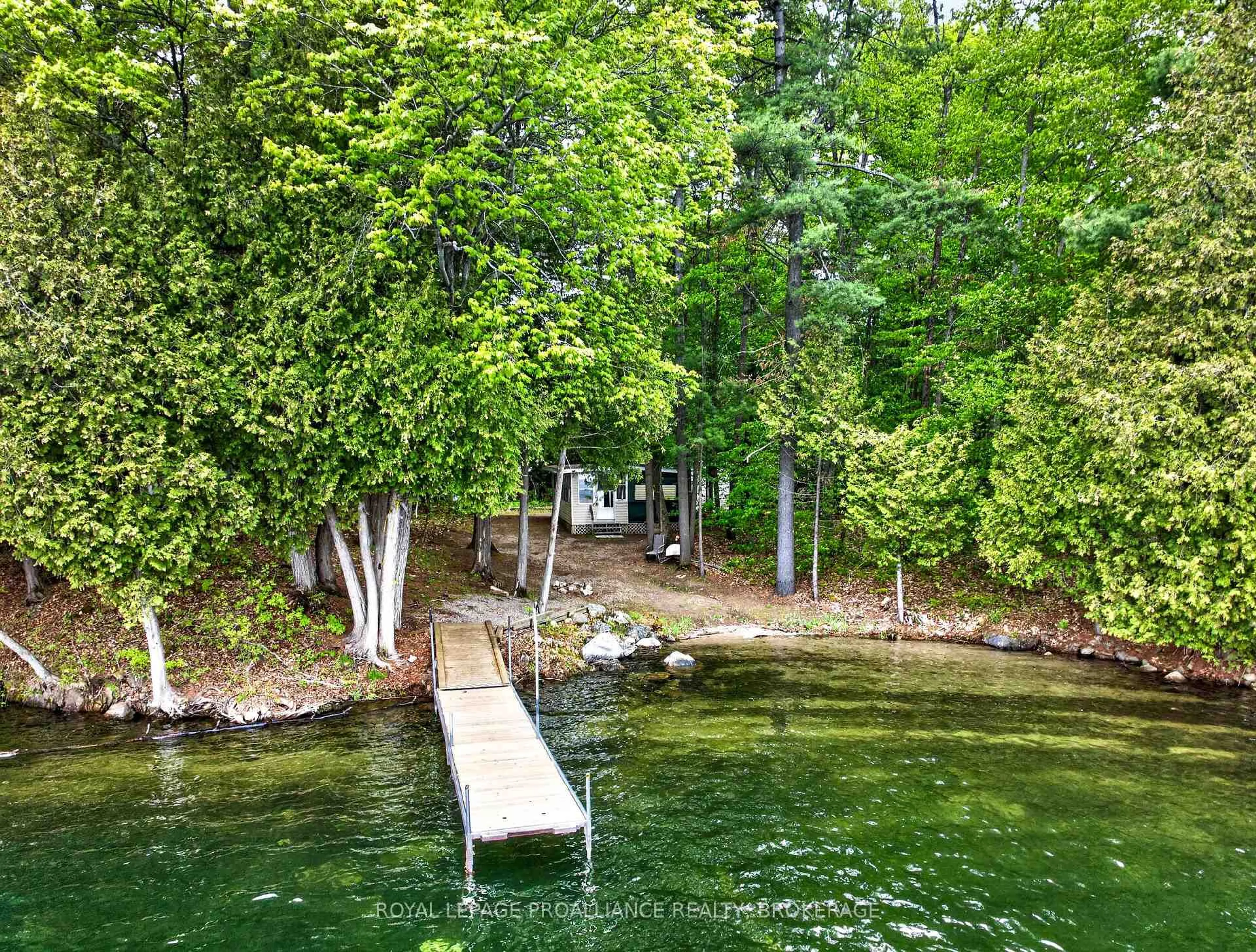 A pic from outside/outdoor area/front of a property/back of a property/a pic from drone, water/lake/river/ocean view for 805 Burns Lane, Godfrey Ontario K0H 1T0