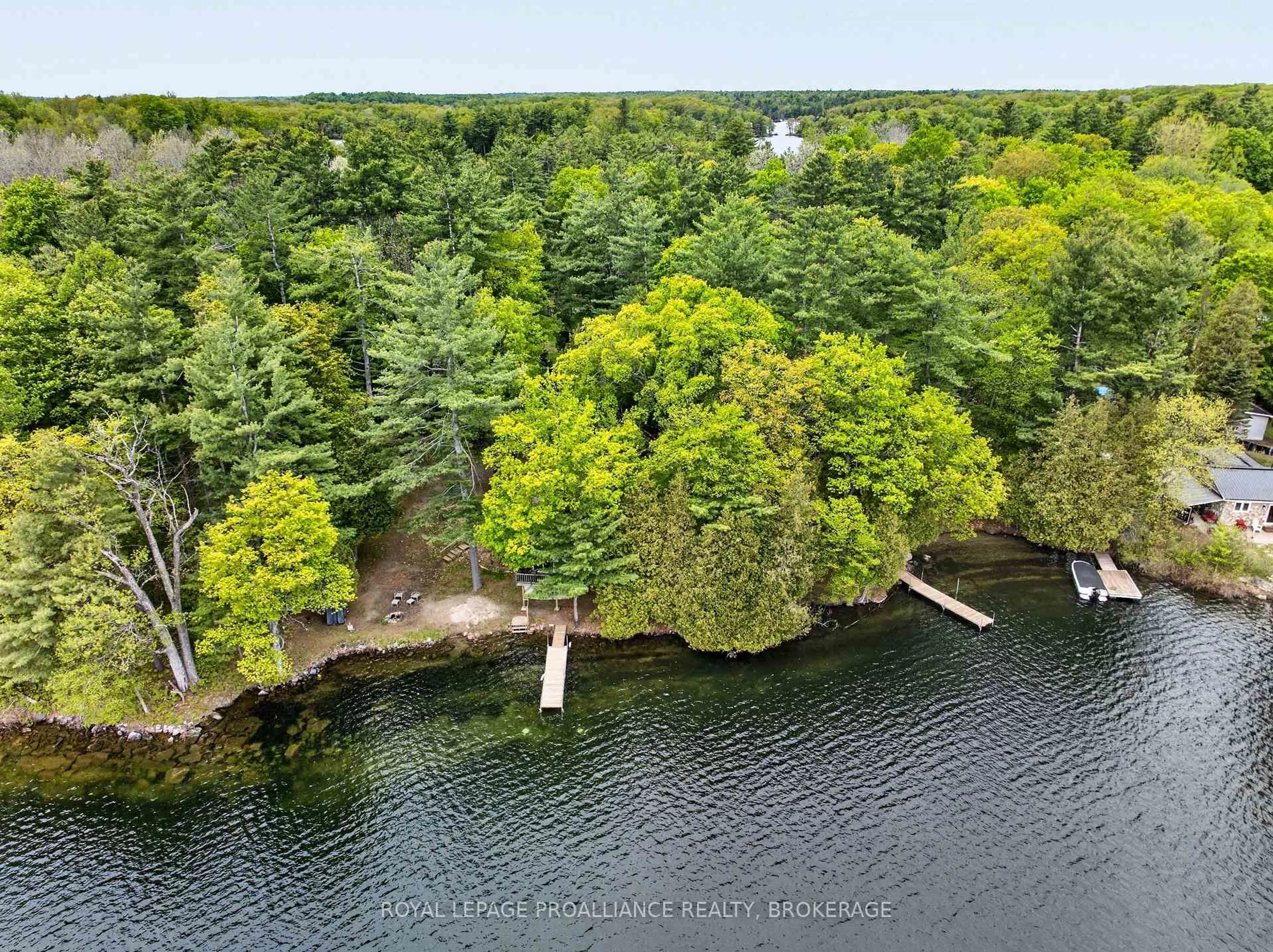 A pic from outside/outdoor area/front of a property/back of a property/a pic from drone, water/lake/river/ocean view for 805 Burns Lane, Godfrey Ontario K0H 1T0