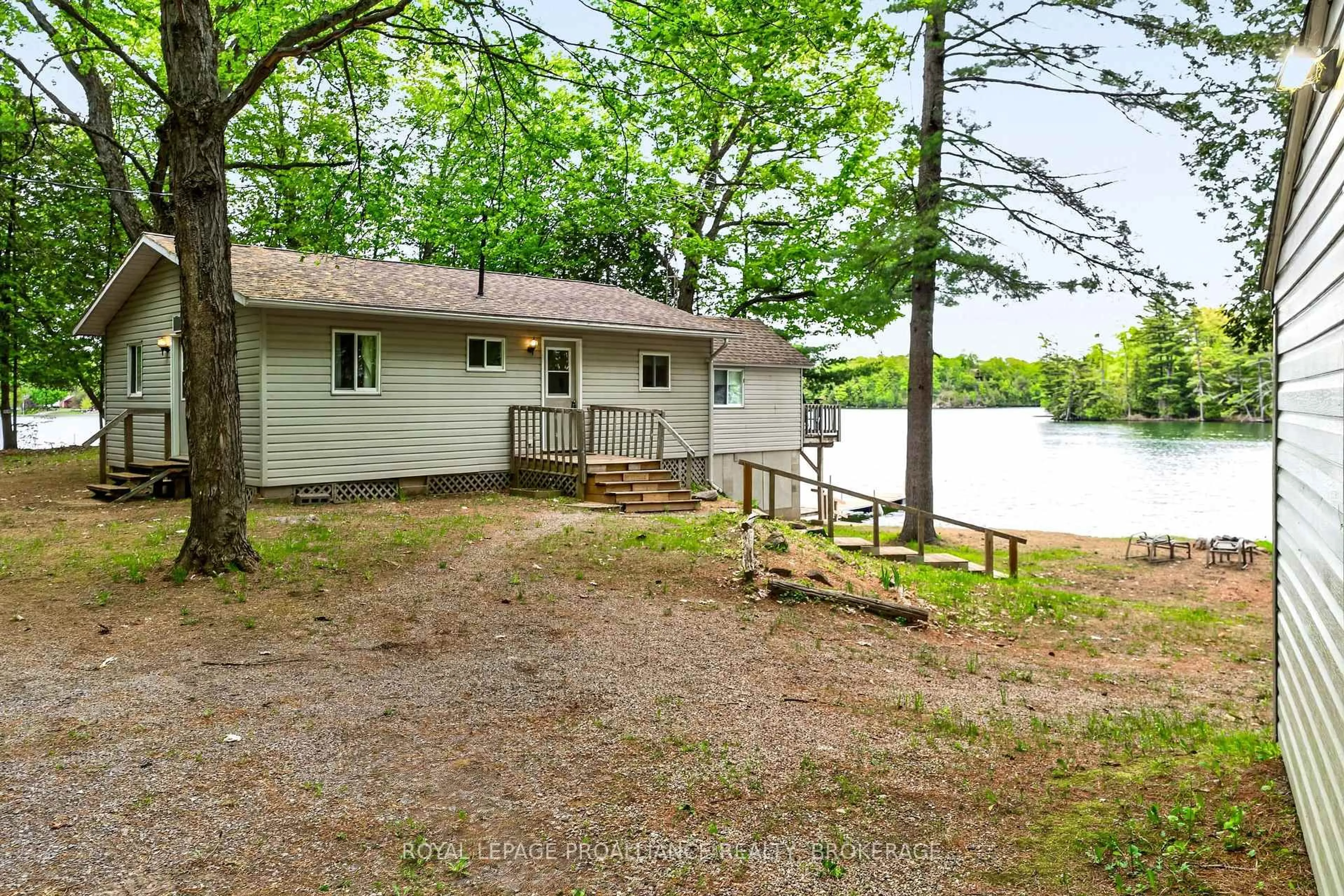 A pic from outside/outdoor area/front of a property/back of a property/a pic from drone, water/lake/river/ocean view for 805 Burns Lane, Godfrey Ontario K0H 1T0