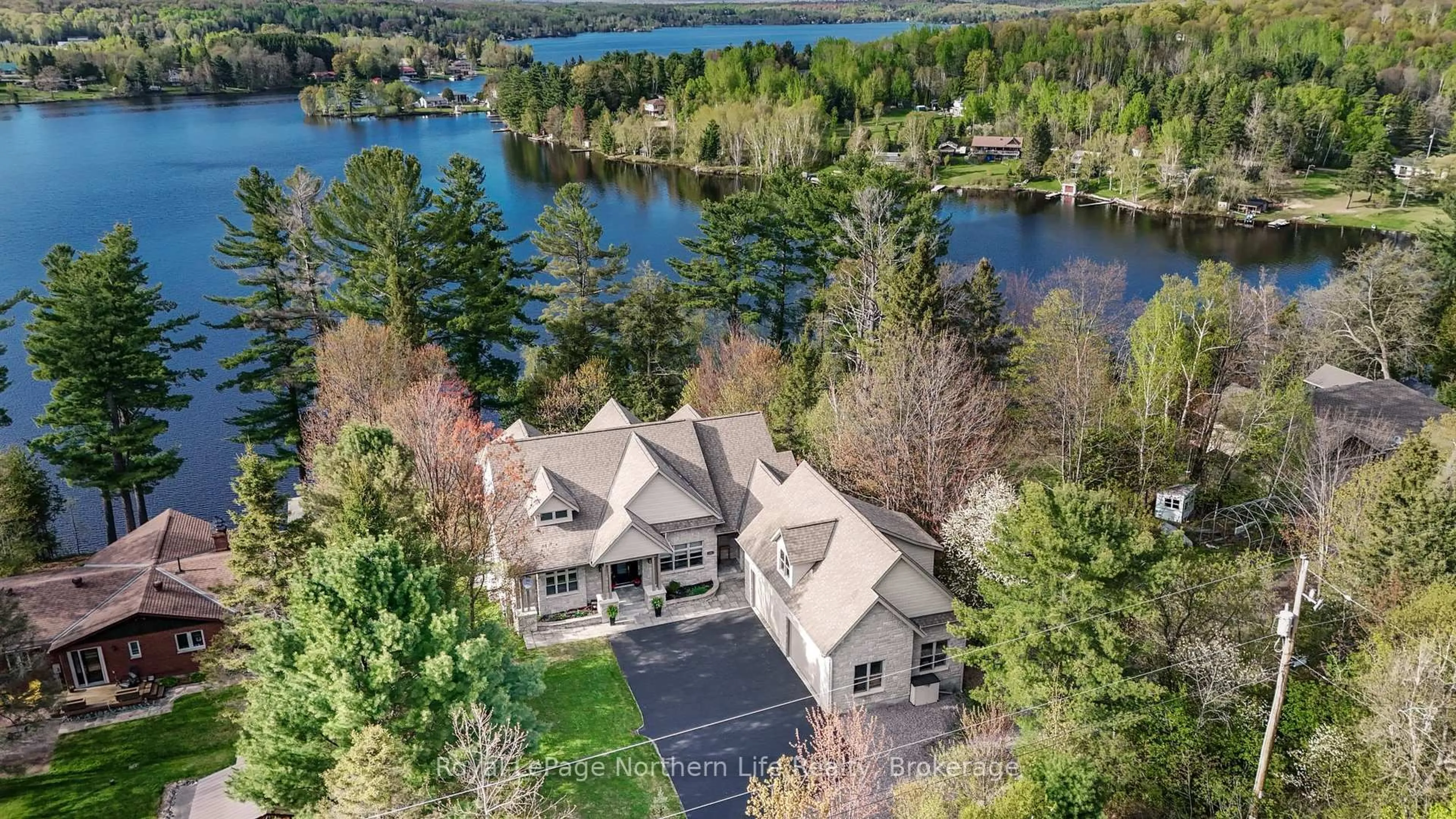 A pic from outside/outdoor area/front of a property/back of a property/a pic from drone, water/lake/river/ocean view for 40 Pargeter Dr, East Ferris Ontario P0H 1B0