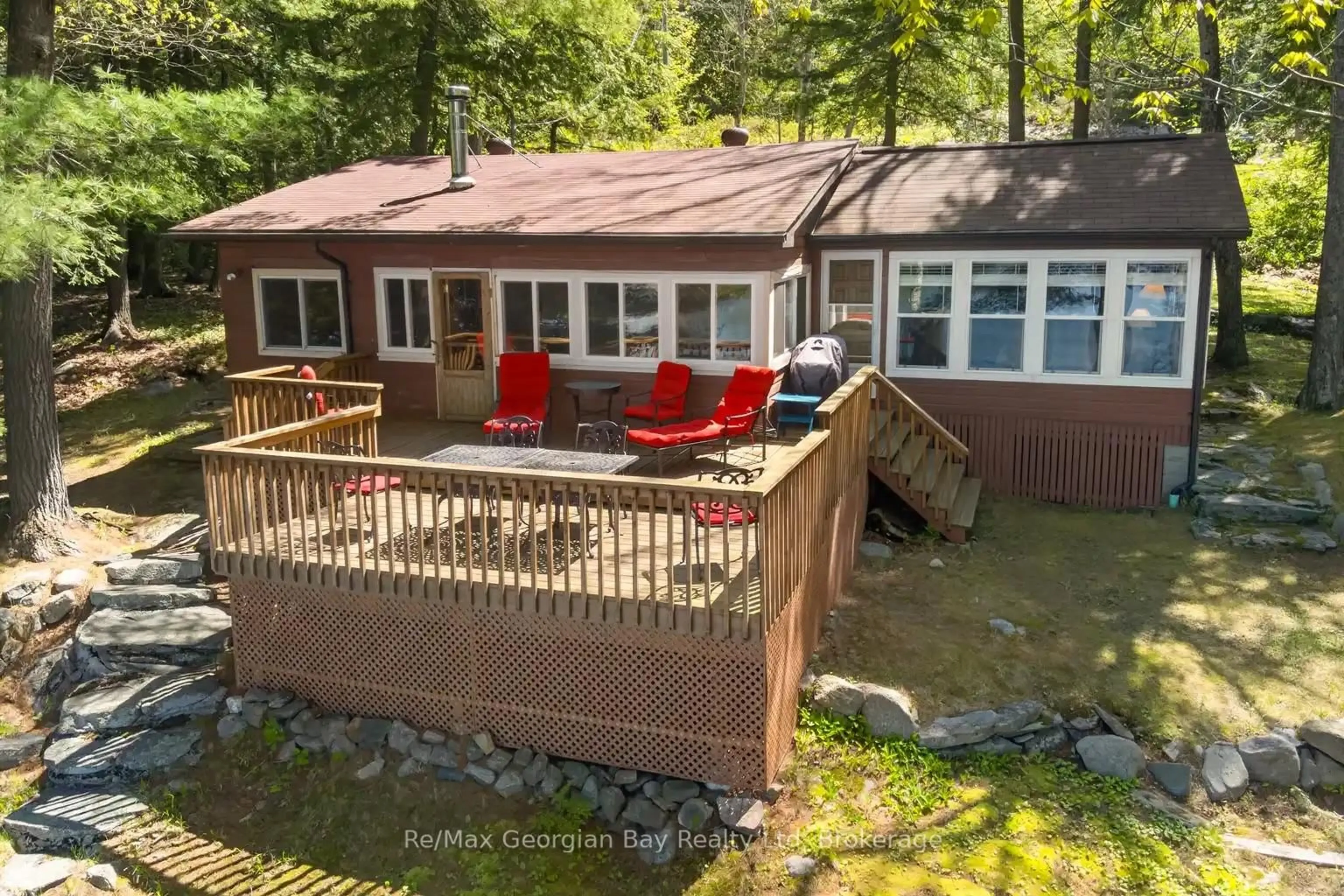 A pic from outside/outdoor area/front of a property/back of a property/a pic from drone, water/lake/river/ocean view for 87 Moccasin Tr, Georgian Bay Ontario L0K 1S0