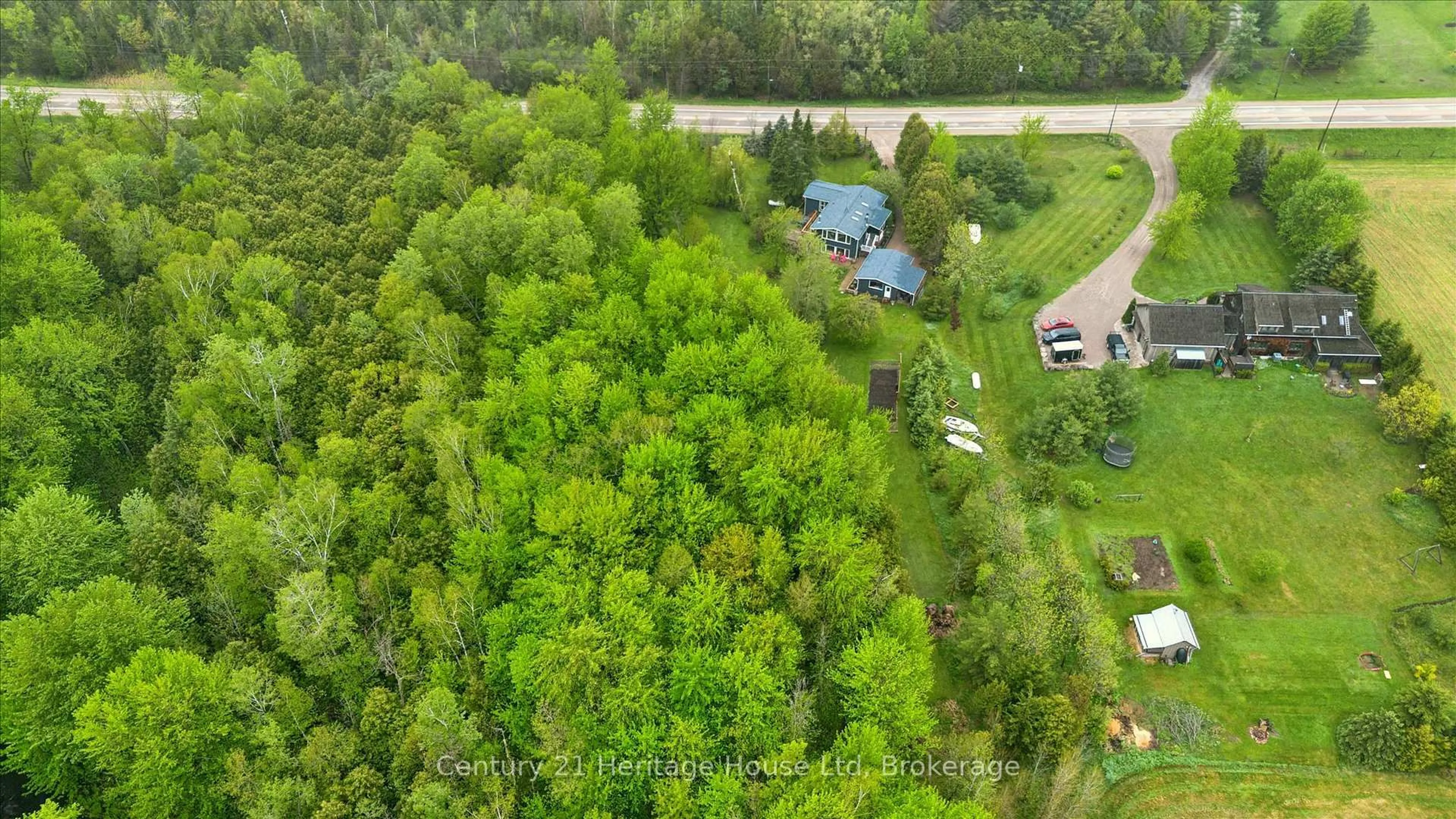 A pic from outside/outdoor area/front of a property/back of a property/a pic from drone, forest/trees view for 7811 Wellington Road #36 Rd, Puslinch Ontario L0P 1J0