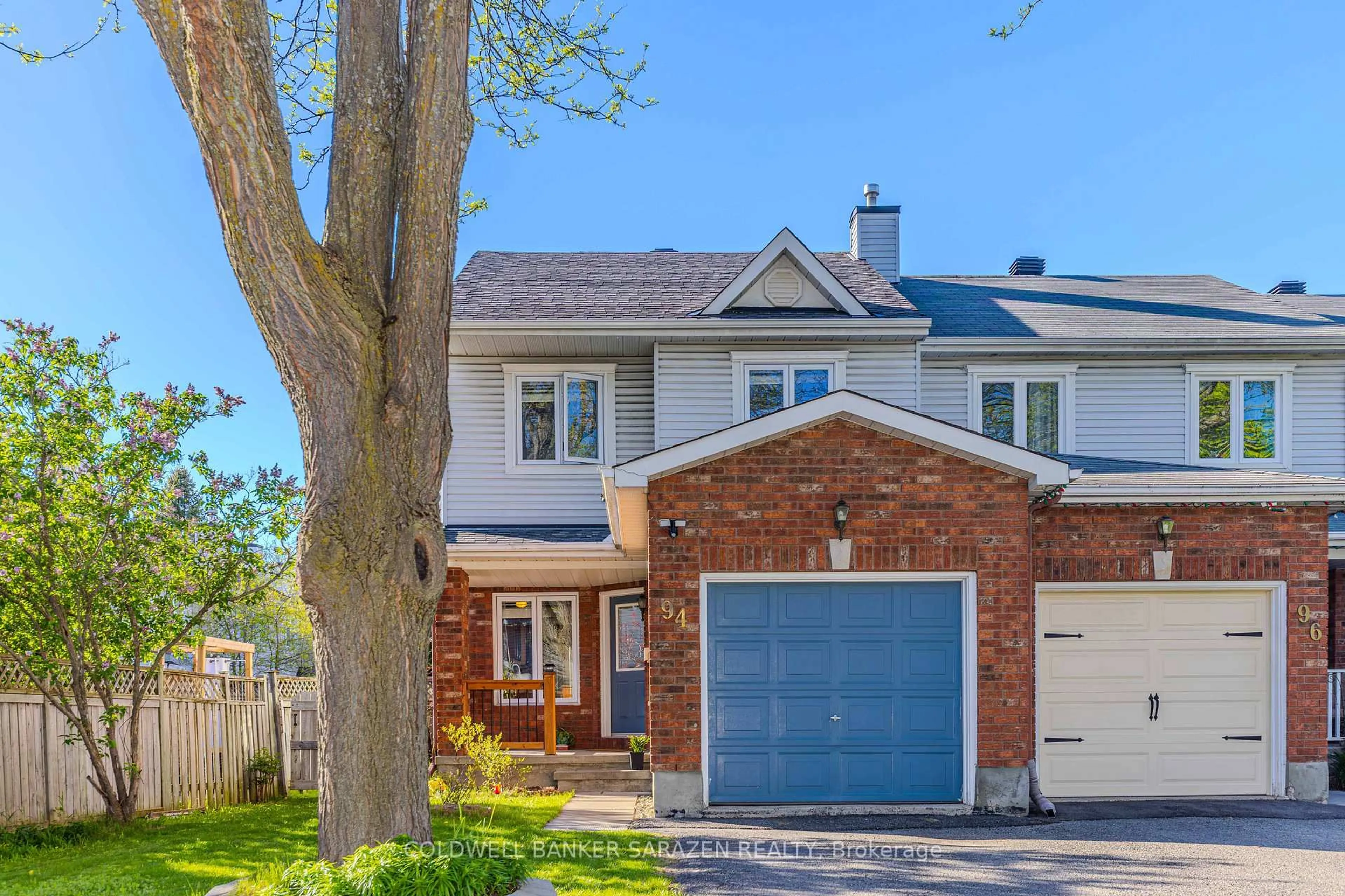 Home with brick exterior material, street for 94 Markland Cres, Ottawa Ontario K2G 5Z7