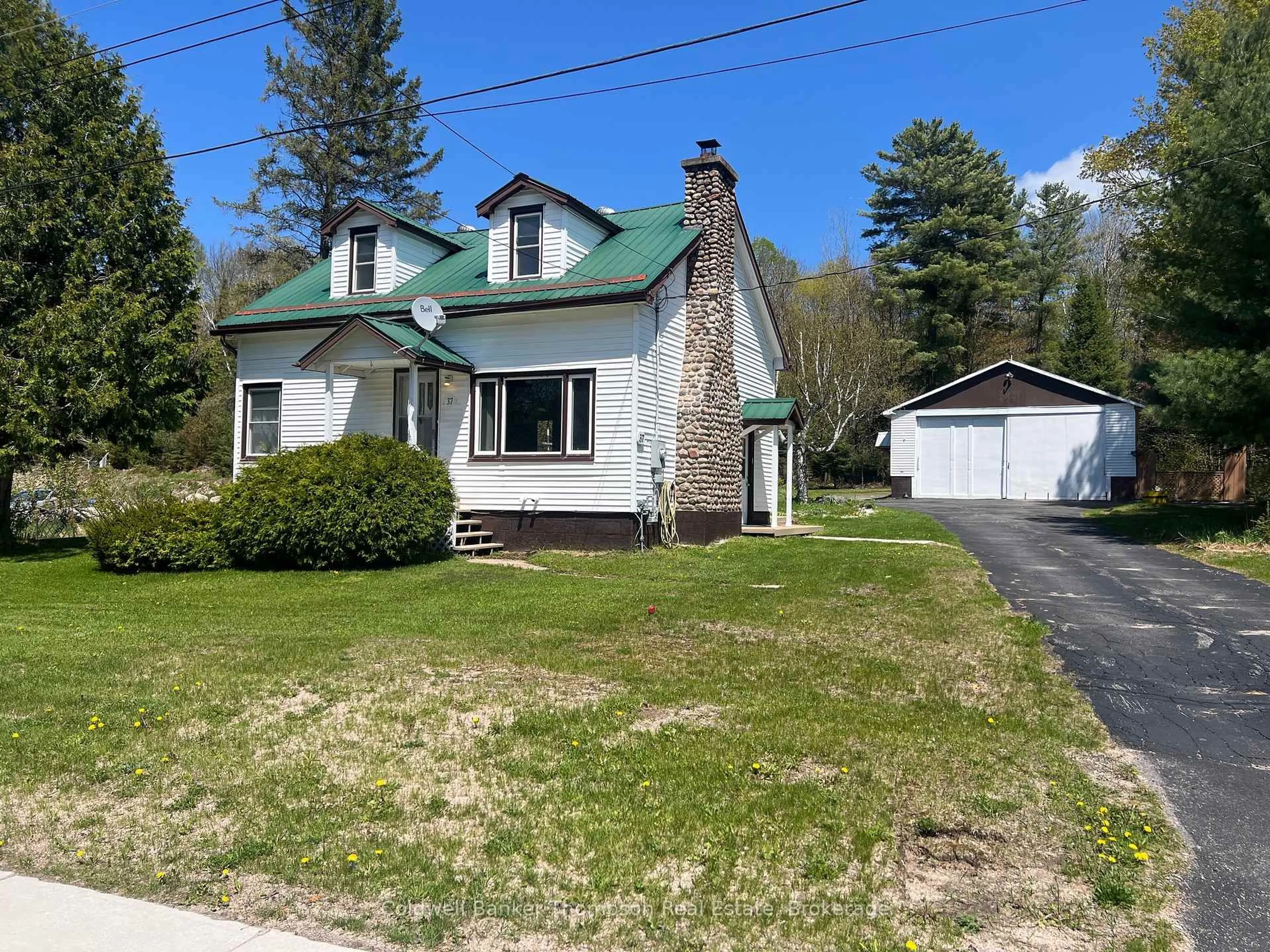 A pic from outside/outdoor area/front of a property/back of a property/a pic from drone, street for 37 Eagle Lake Rd, South River Ontario P0A 1X0